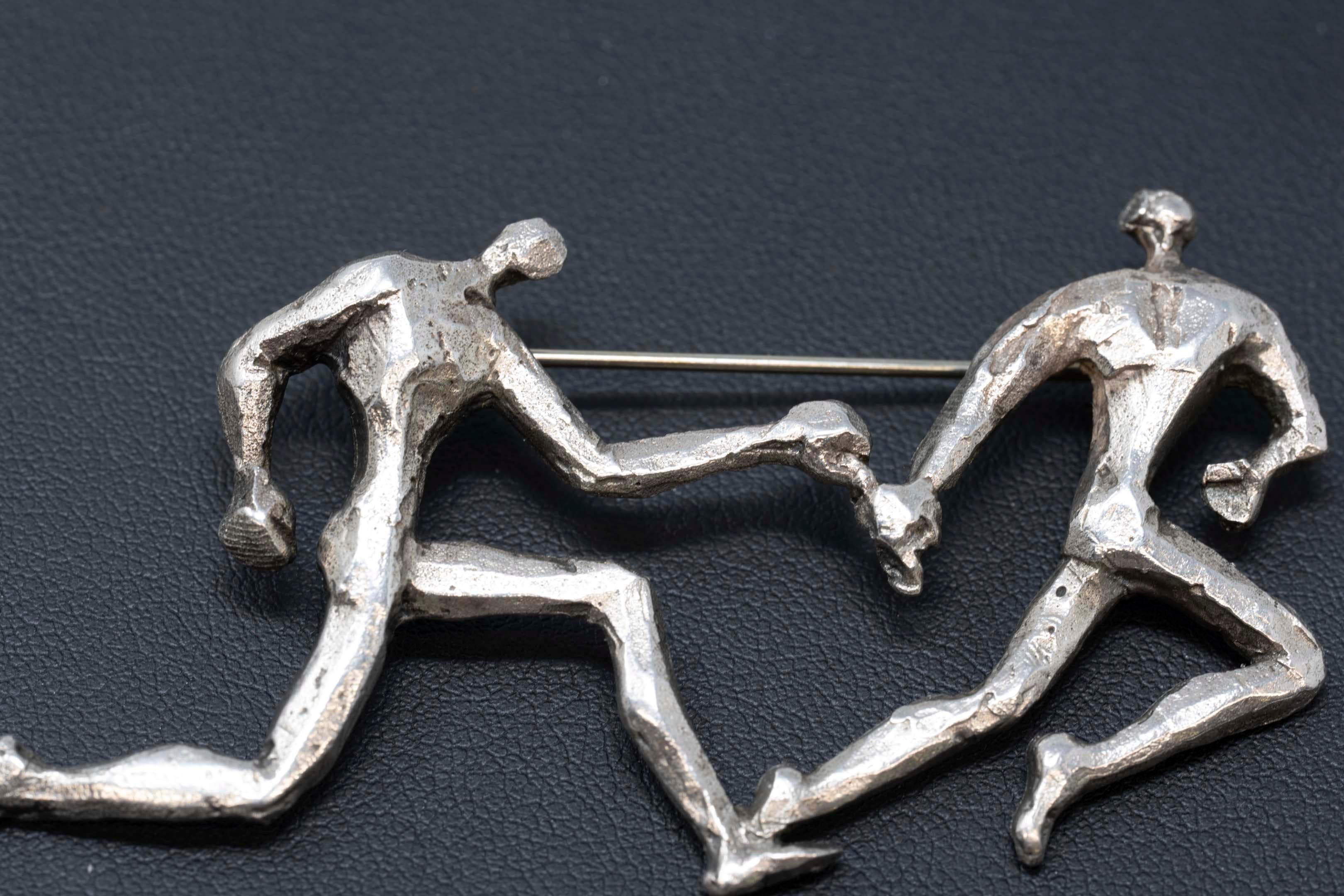 Sterling silver brooch made by Canadian sculptor Esther Wertheimer, born 1926-2016. The brooch is titled 