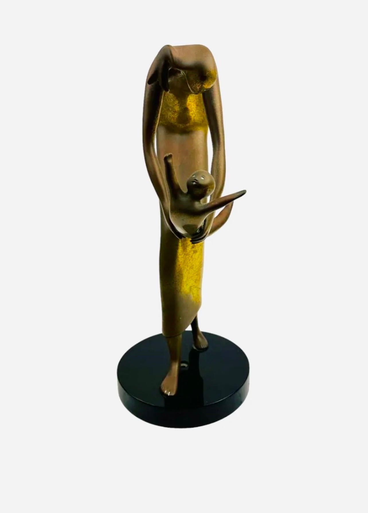 Esther Wertheimer ( Polish, Canadian 1926 - 2016 )
Hand signed  Wertheimer
Dimensions: 14.5 X 8 X 5.75 in.

This semi abstract figurative bronze sculpture depicts the tenderness and the loving bond shared between Parent and child, mother and infant