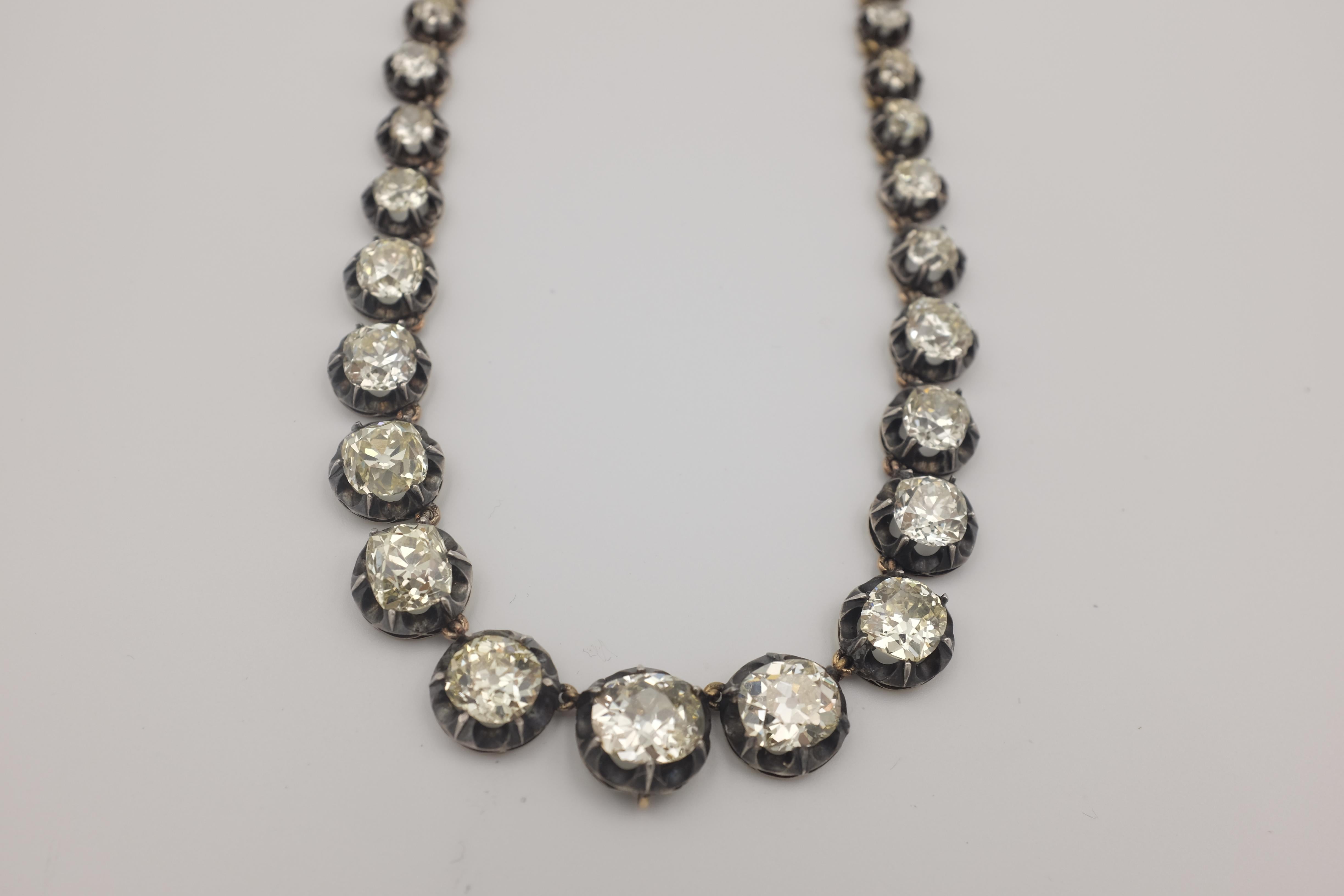Impressive Victorian Diamond Riviere Necklace of40 collet-mounted old cut diamonds in original Victorian setting.  Majority of stones are VS or better. H-I color to L-M, light cape at warmest.  