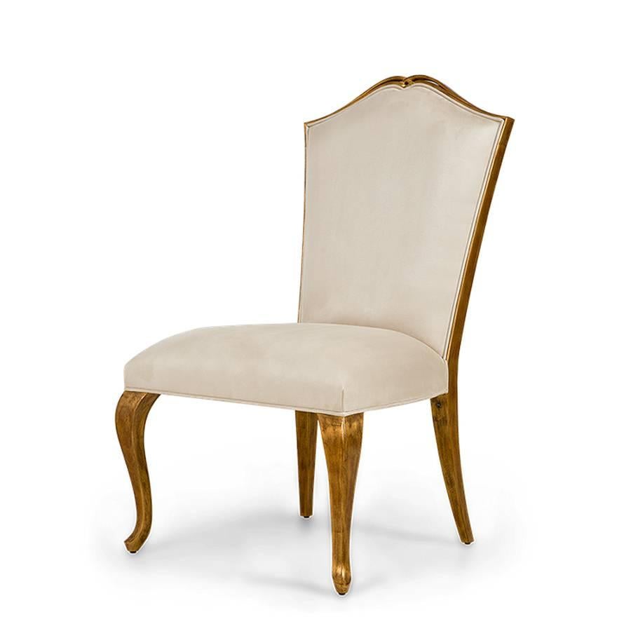 Chair Estiva with structure in handcrafted veneer
mahogany wood with gold painting. With high quality 
satin white fabric.
Also available with others fabrics.