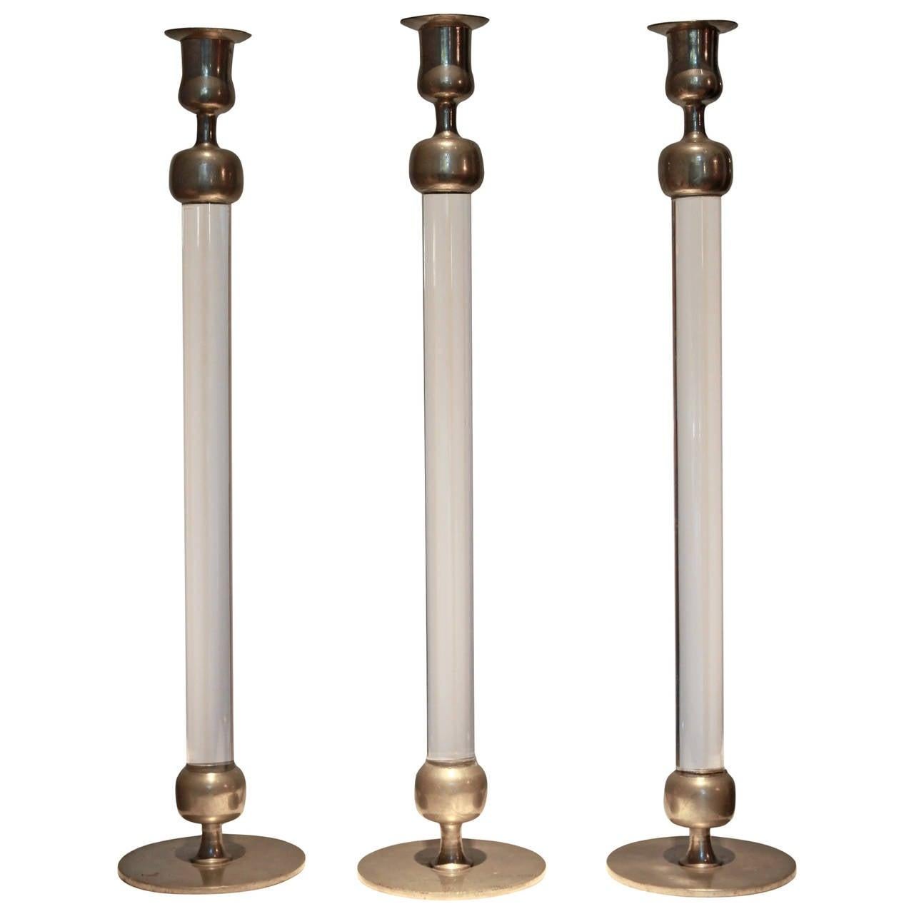 Three candlesticks in pewter and plexiglass,
designed by Estrid Ericson and edited by Svenskt Tenn Stockholm, 1960,
stamped.