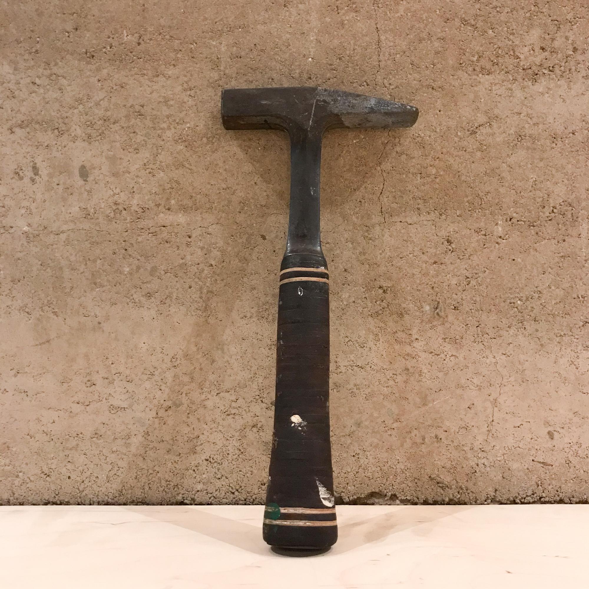 Tool
Vintage Rock Fossil Geological Cement Pick Hammer full of character and history
Comfy Leather Grip Handle with Great Balance. By Estwing Illinois USA
Measures: 12 L x 5.5W x 1 Thick
Original Unrestored Vintage Condition Item Preowned Well Used