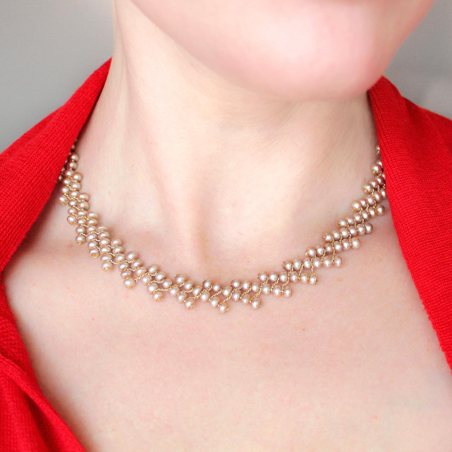 Champagne Pearl Ascending Ribbon Necklace handmade by jewelry artist Estyn Hulbert on a gold-filled chain with a 14k yellow gold clasp. 18 inches long.