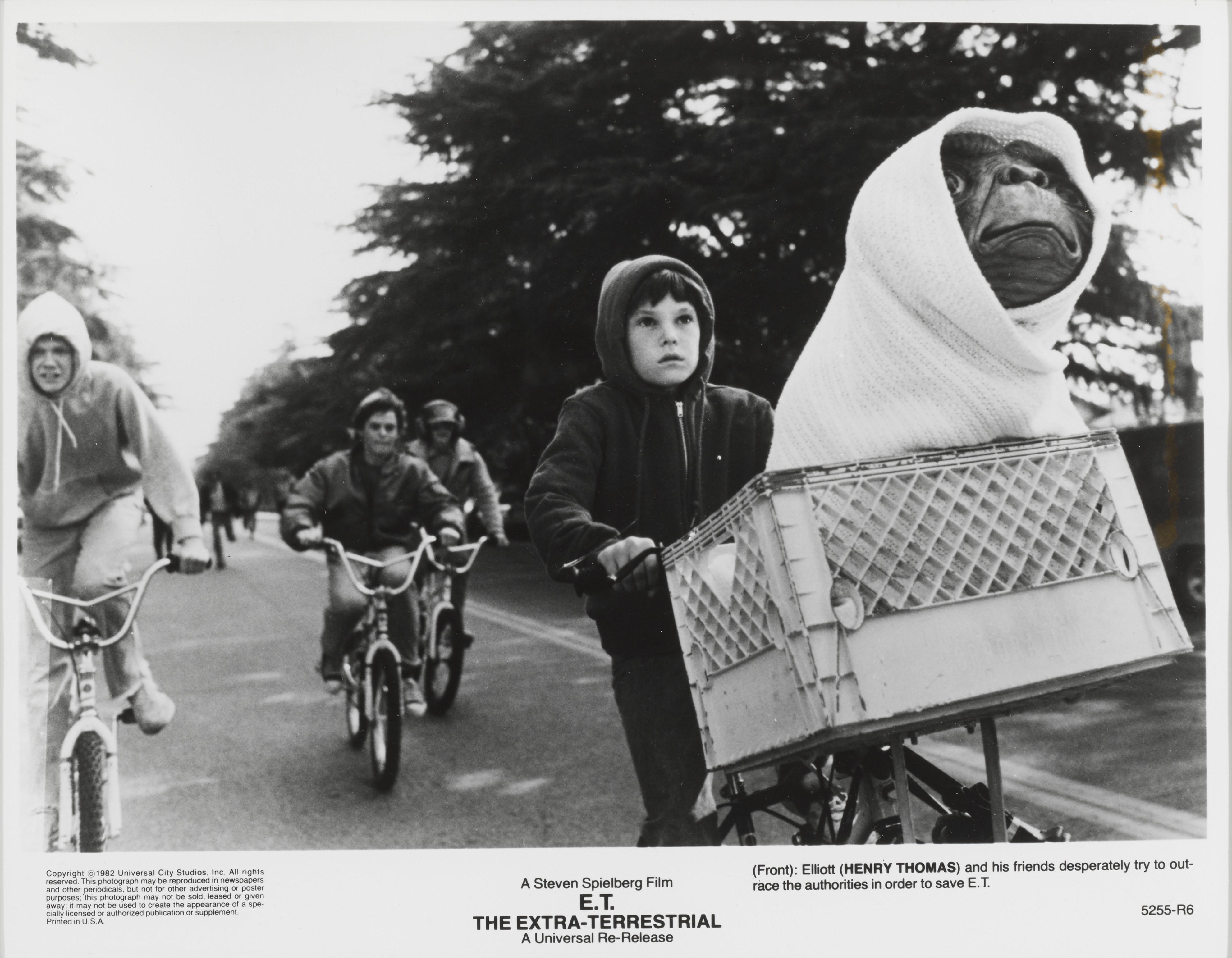 Original US studio production photo for Steven Spielberg's classic 1982 science fiction film E.T. This film starred Dee Wallace, Drew Barrymore and Peter Coyote.
This piece is conservation framed with UV Plexiglas and would be shipped boxed by