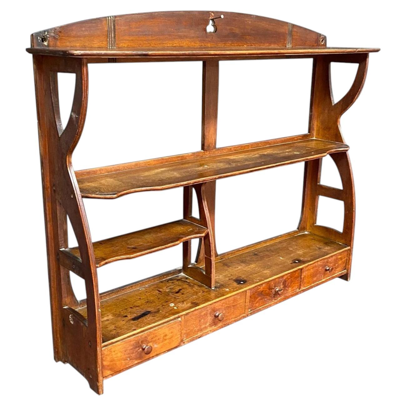 Estantería de estilo Art Nouveau de haya teñida, de alrededor de 1900, con tres cajones