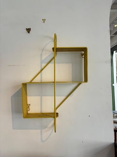 Étagère clé de sol par Mathieu Matégot