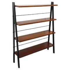 Etagère sur pieds vintage en teck et métal noir style String Tomadio années 60