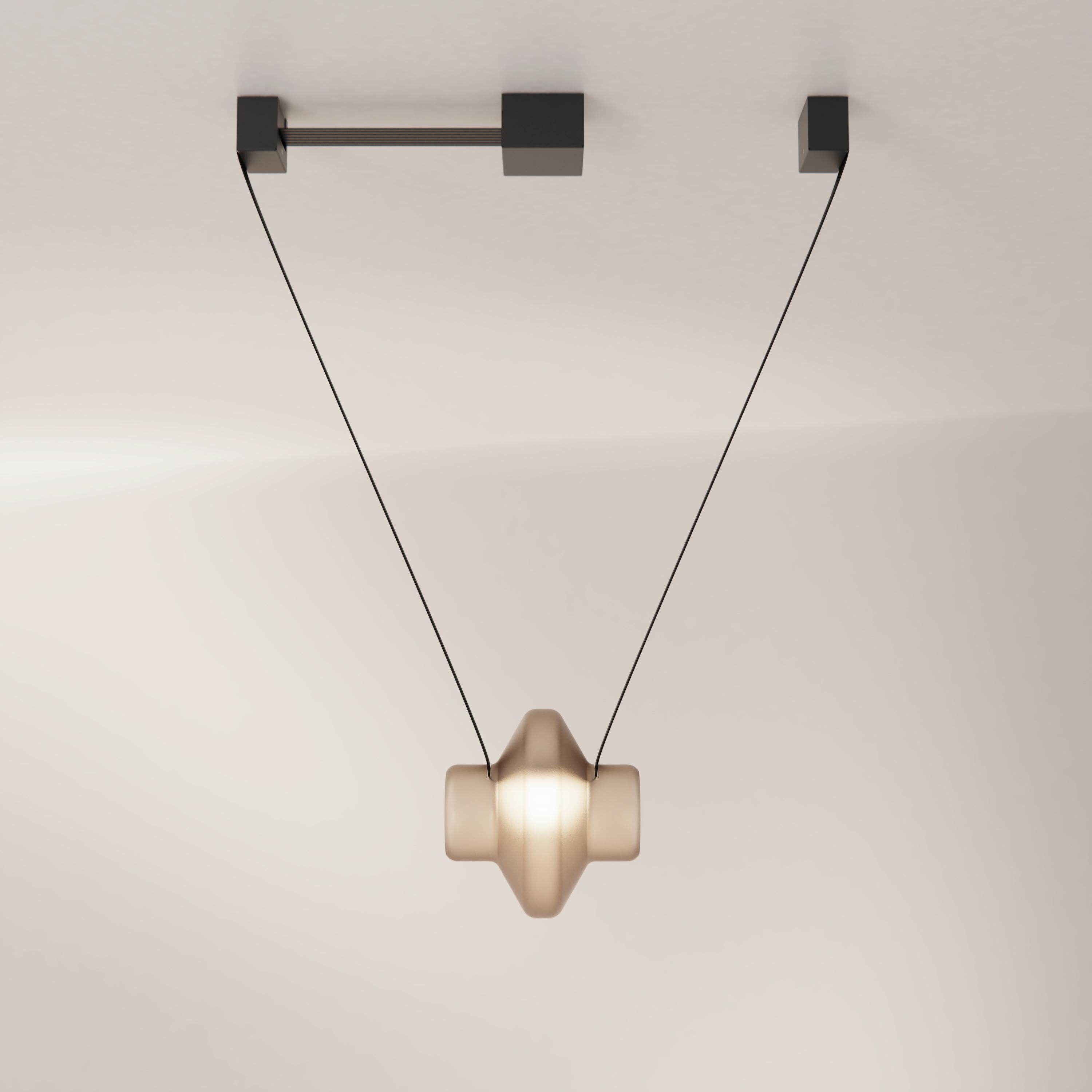 Etat-des-Lieux is a contemporary lighting system with an adaptive silhouette. The 1C configuration is a single pendant that can also be added to other modules to create a unique luminaire.

Etat-des-Lieux, a contemporary lighting system defined by