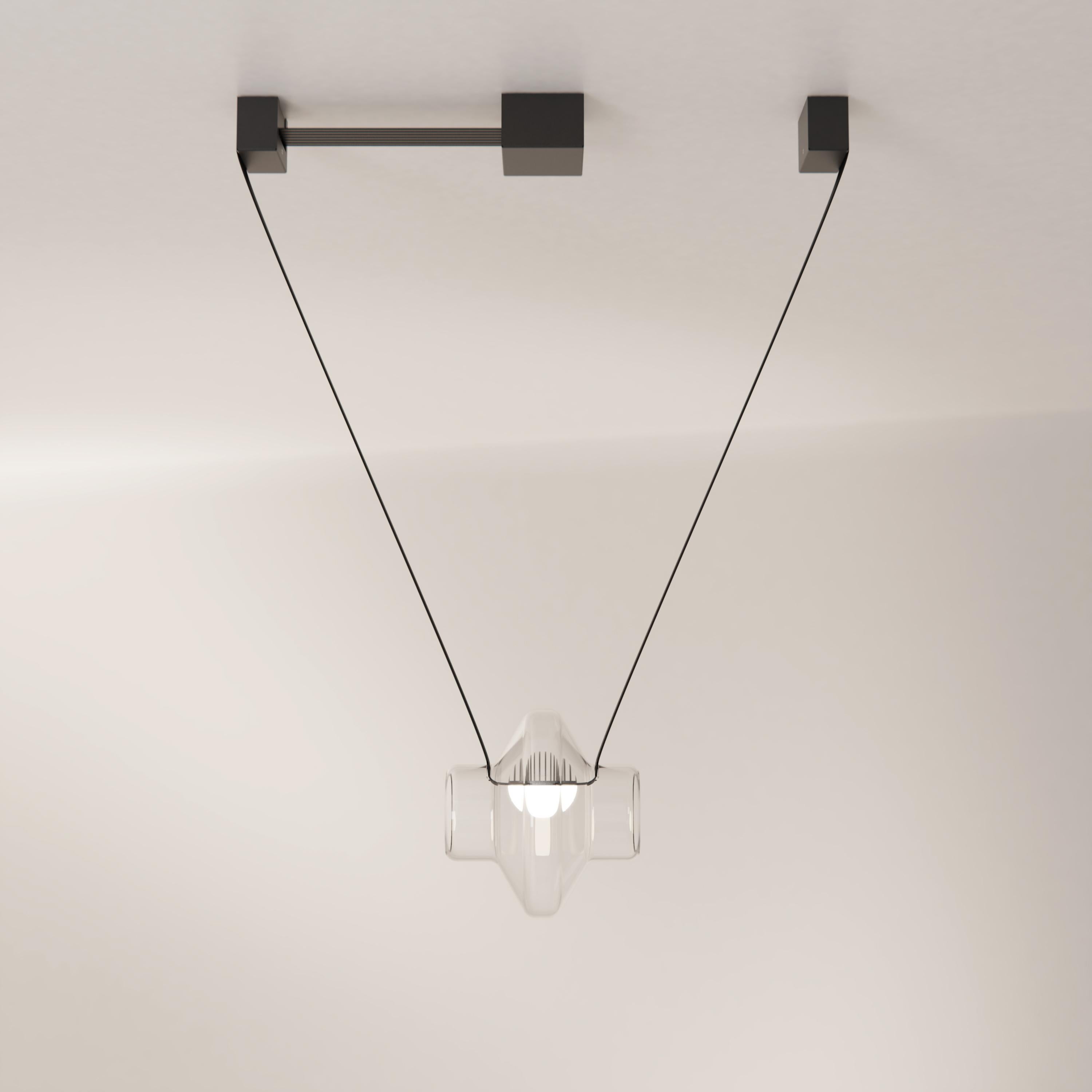 Etat-des-Lieux is a contemporary lighting system with an adaptive silhouette. The 1C configuration is a single pendant that can also be added to other modules to create a unique luminaire.

Etat-des-Lieux, a contemporary lighting system defined by