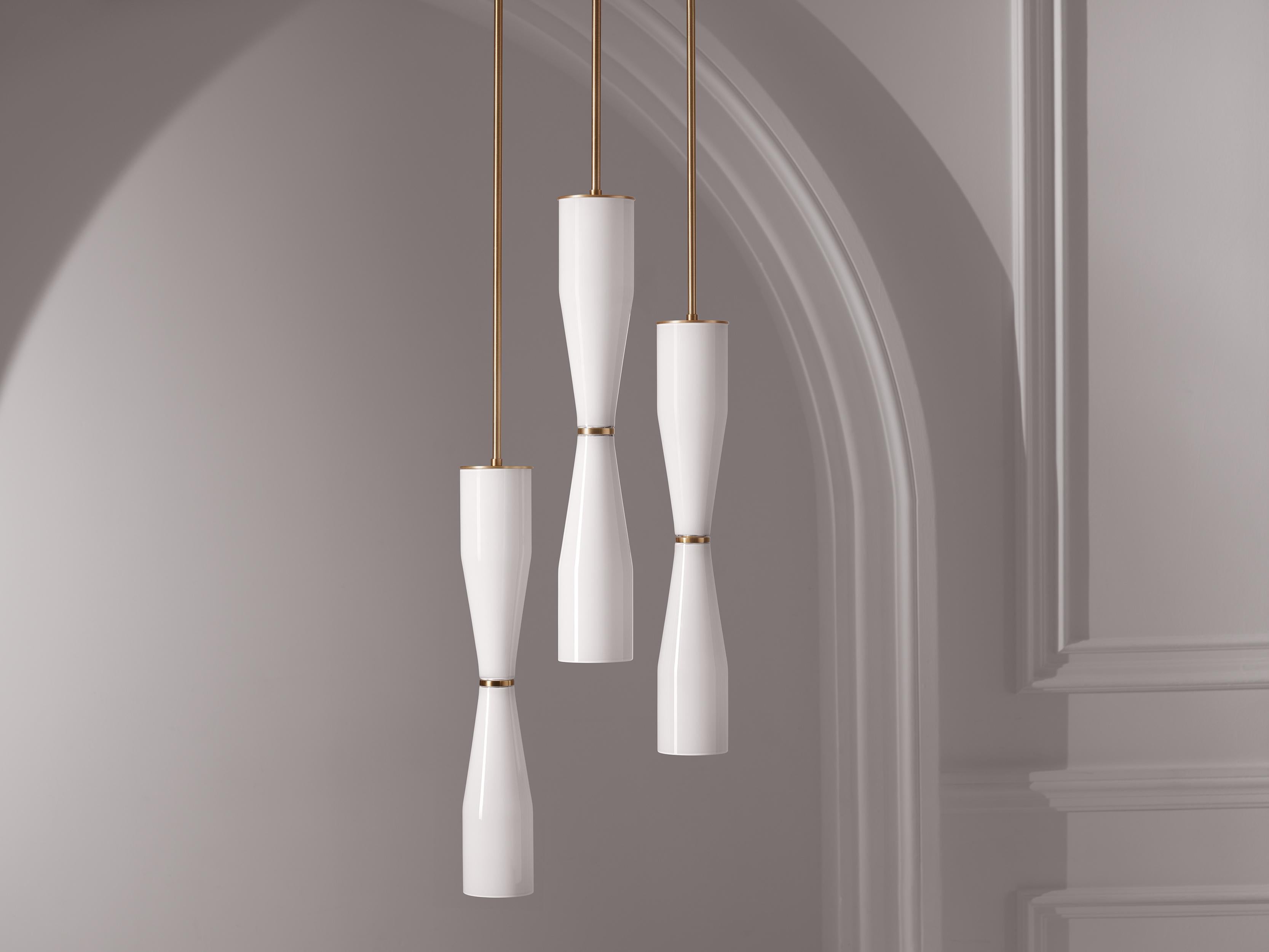 The Etcetera Pendant balances the sculptural with the streamlined.  With an organic feel, the Etcetera Series uses design geometry to create pieces that are clean-lined yet natural. 

Entirely hand-made in Canada, Etcetera uses a small palette of