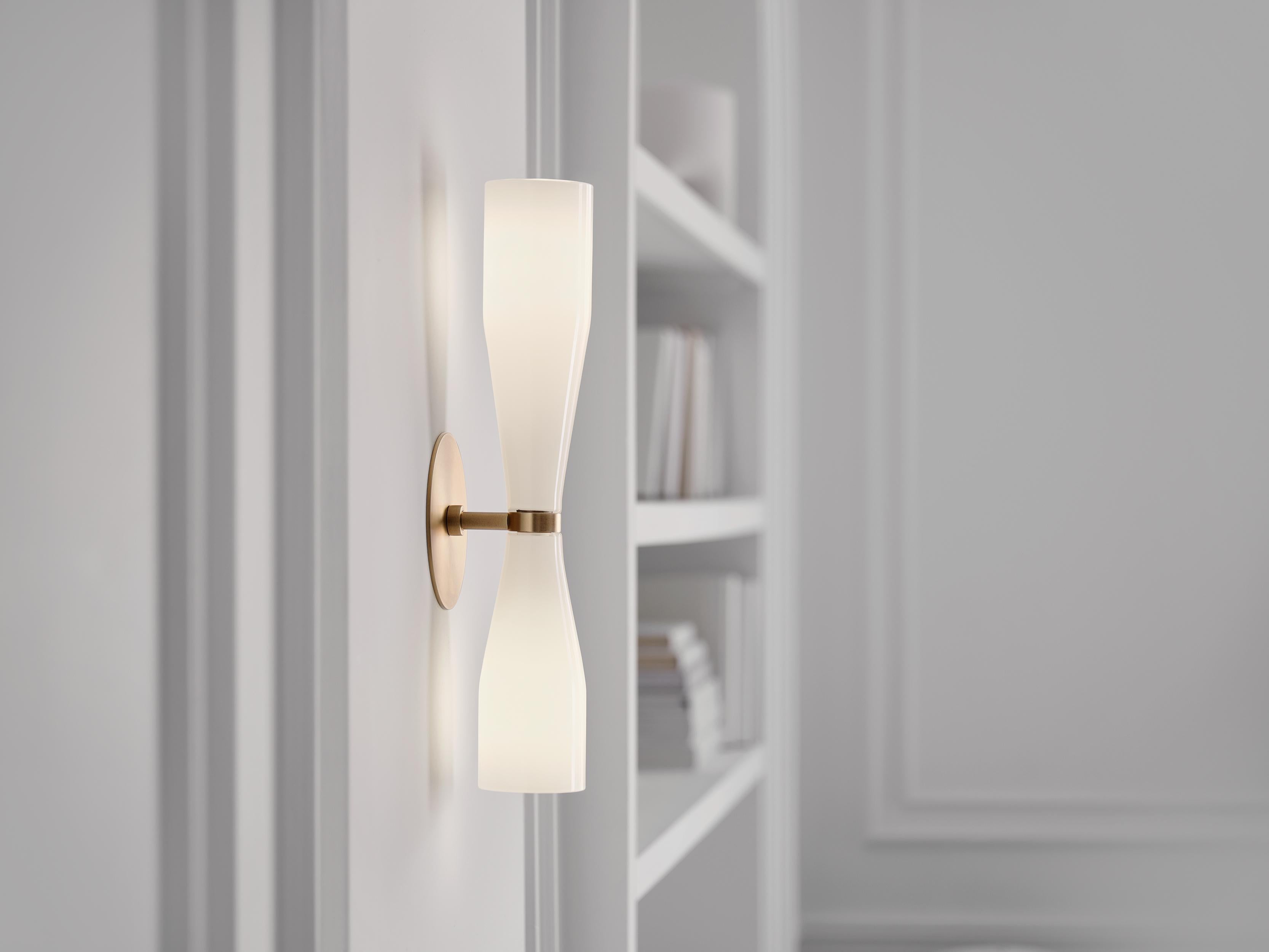 The Etcetera Sconce balances the sculptural with the streamlined. 

With an organic feel, the Etcetera Series uses design geometry to create pieces that are both clean-lined but natural. 

Entirely hand-made in Canada, Etcetera uses a small palette