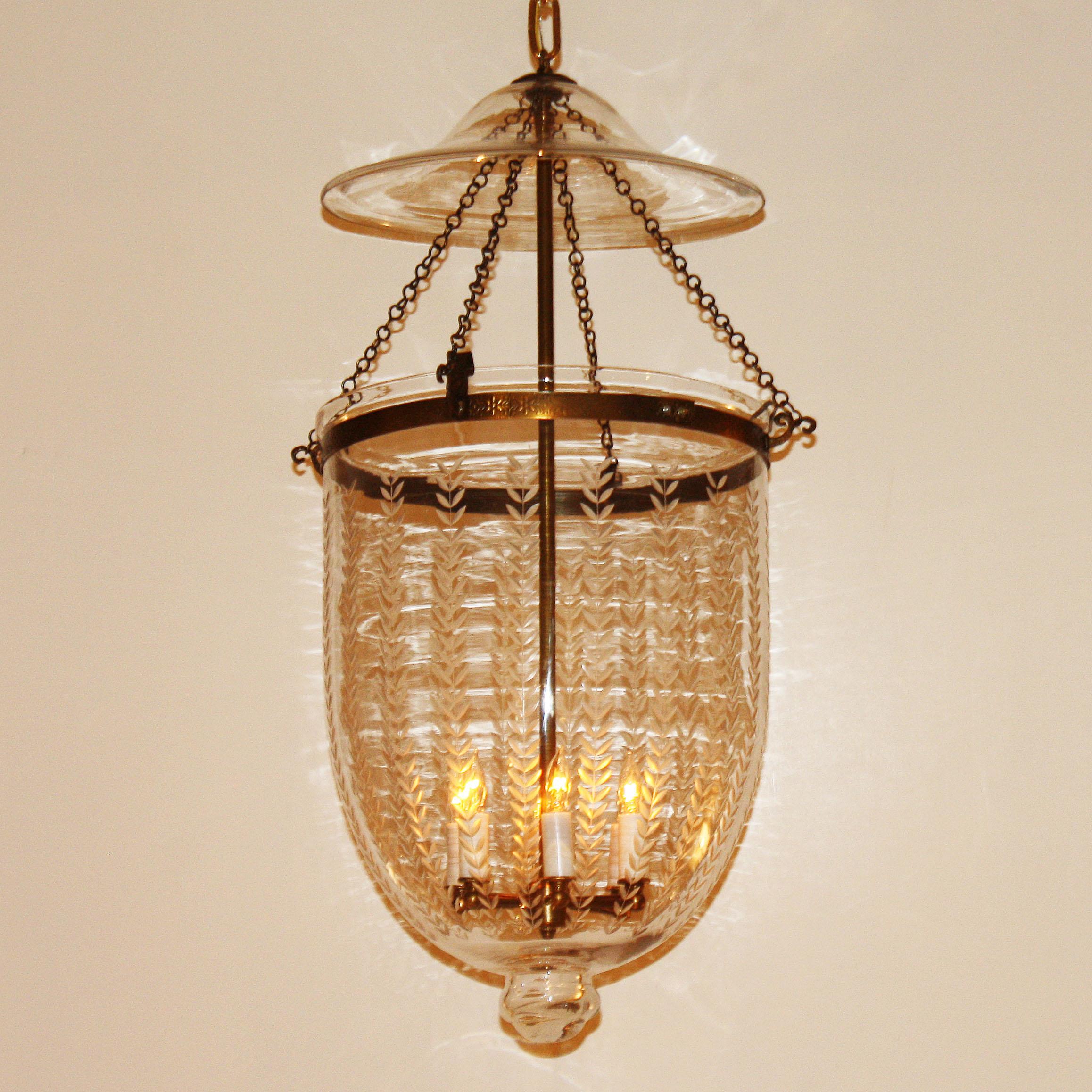Etched bell lantern with brass details, circa 1950.
$7500.