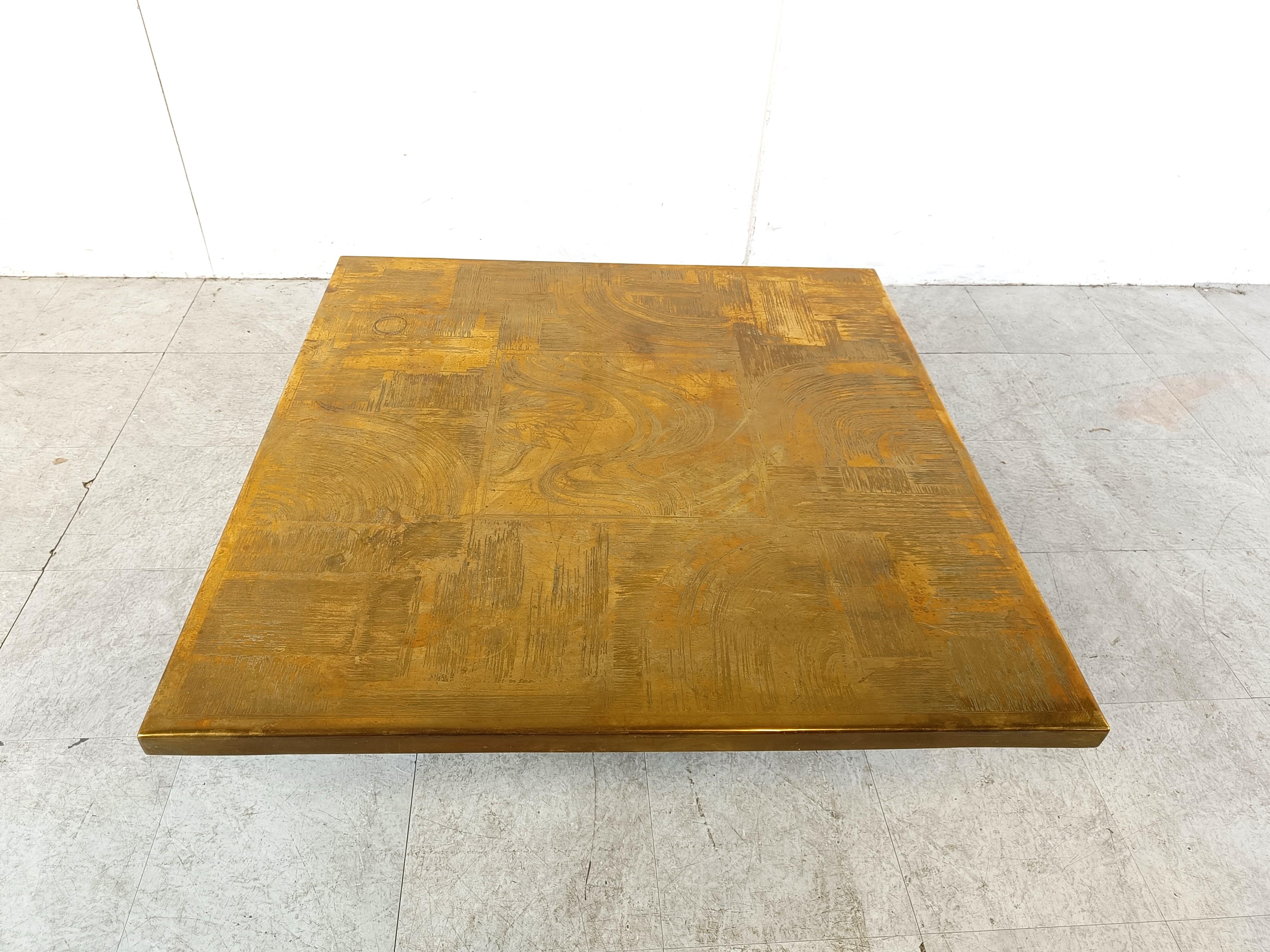 Etched brass coffee table signed by Christian Heckscher,

The coffee table is made of a etched brass top and a black metal base.

The brass is nicely patinated.

1970s - France

Dimensions
Height: 35cm/12.99