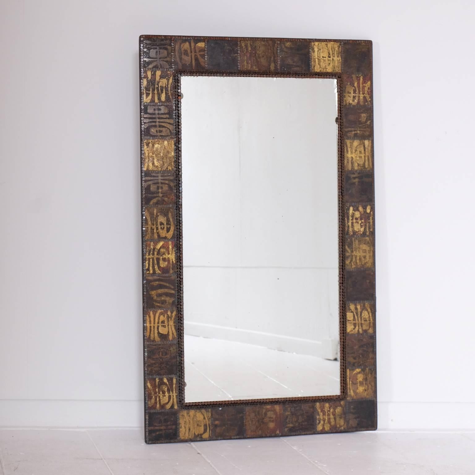 Mirror with etched brass frame.