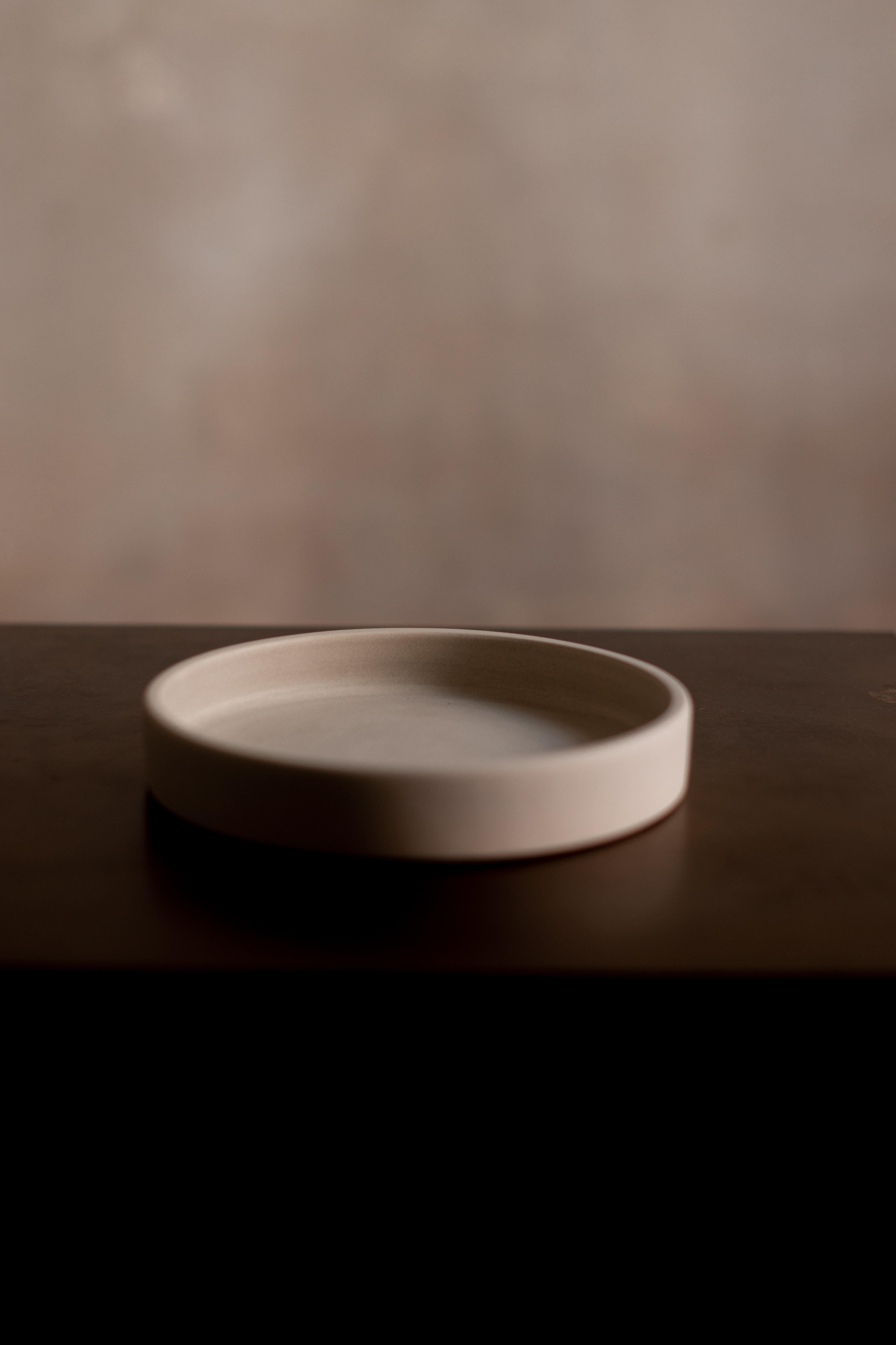 EUCLID SERVE-WARE  OLLECTION   is a collectible piece from our serveware series, embodying the same devotion to craftsmanship, material honesty, and intentional design that defines the ÉTER ethos. Formed entirely by hand from the purest Peruvian