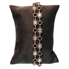 Eterna Bracelet Elegant a Two-Line Design with Emerald & Circular Motifs