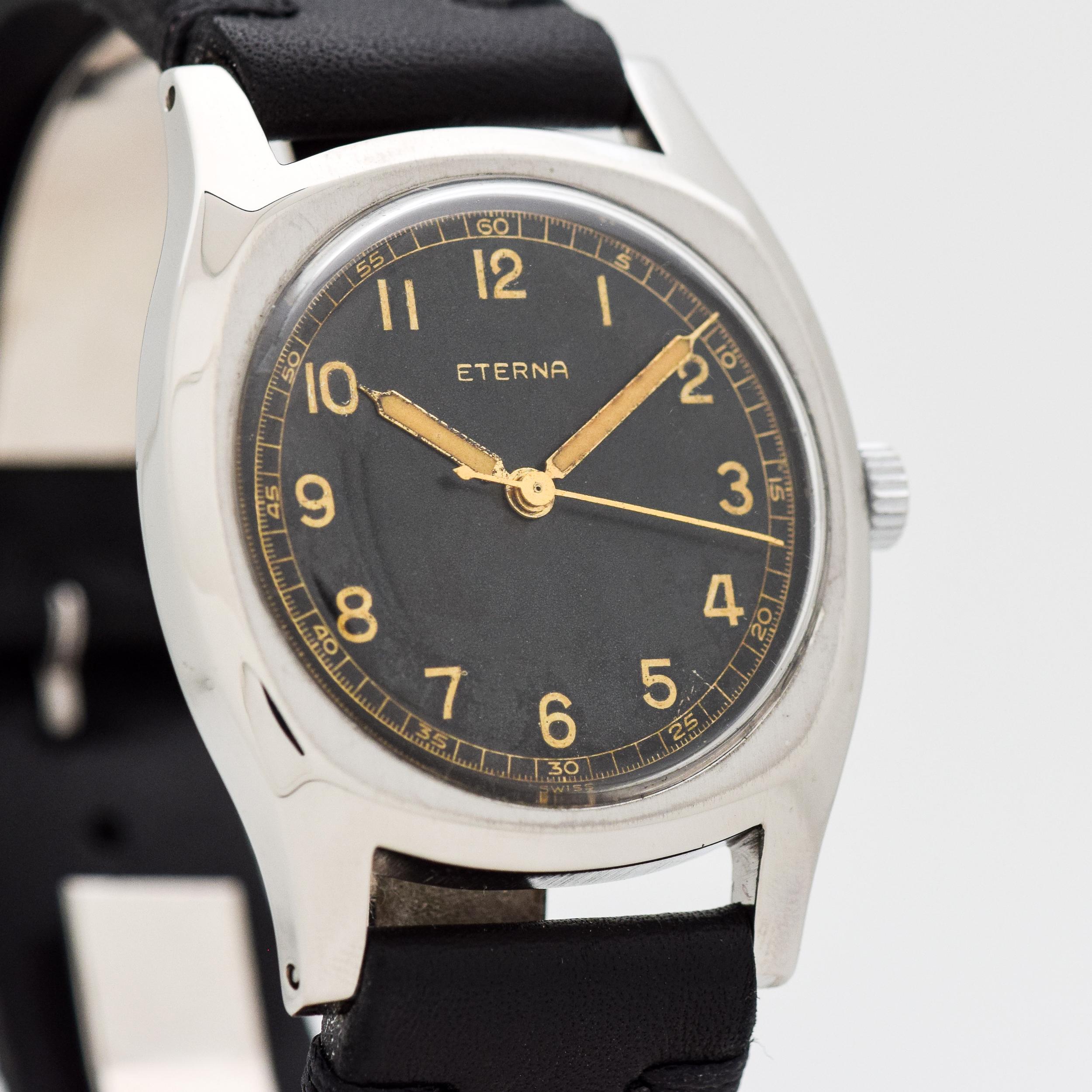 1930’s - 1940’s Vintage Eterna Majetek (Used by Czech Air Force) Stainless Steel watch with Original Black Dial with Luminous Arabic Numbers. 38mm x 47mm lug to lug (1.5 in. x 1.85 in.) Manual caliber 852-L movement. Equipped with a Genuine Leather