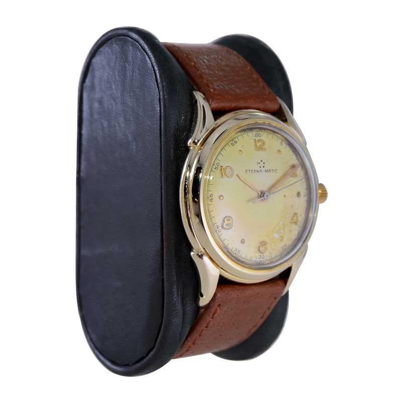 FACTORY / HOUSE: Eterna Watch Company
STYLE / REFERENCE: Art Deco / Round
METAL / MATERIAL: Yellow Gold Filled
CIRCA / YEAR: 1940 / 50's
DIMENSIONS / SIZE: Length 41mm X Diameter 33mm
MOVEMENT / CALIBER: Automatic Winding / 17 Jewels 
DIAL / HANDS: