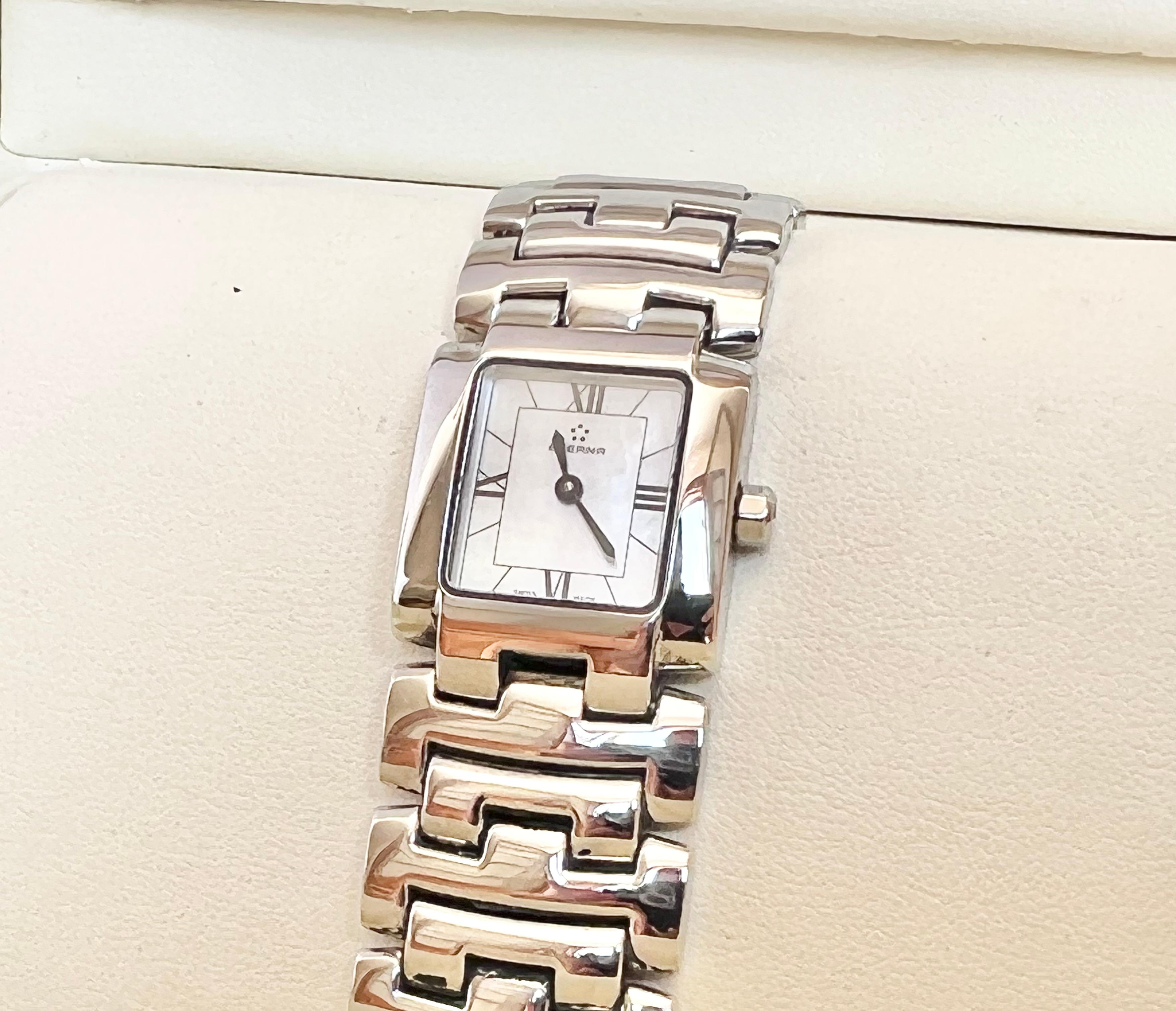 Brand : Eterna

Model: Minx 2608.41/C

Referance Number:2608.41/C

Features: MOP Dial

Country Of Manufacture: Switzerland

Movement: Quartz

Case Material: Stainless Steel

Measurements : :22mm diameter (excluding crown )

Band Type : Steel