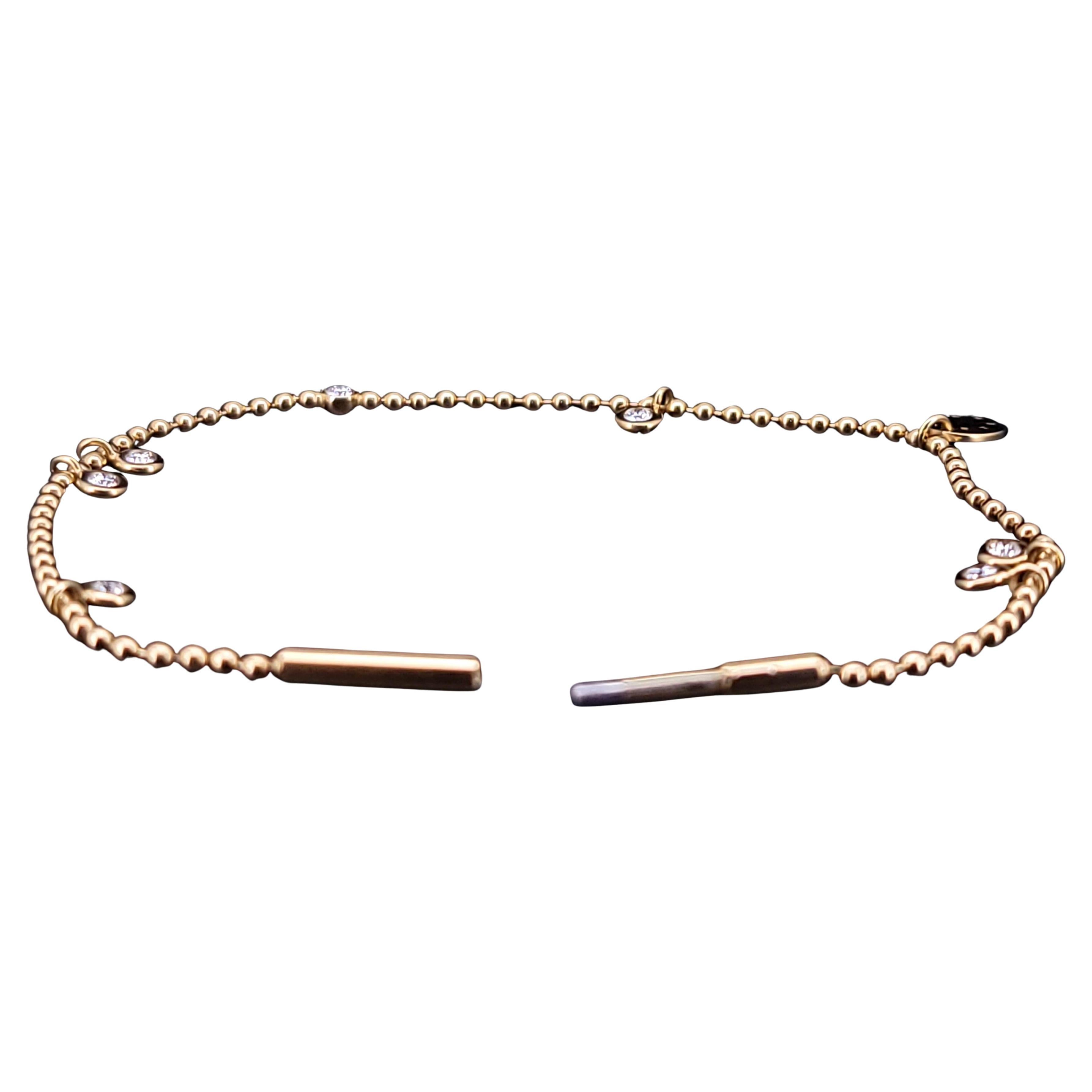 Eternal ball chain bracelet with diamods and a club yellow gold
