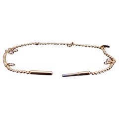 Eternal ball chain bracelet with diamods and a club yellow gold