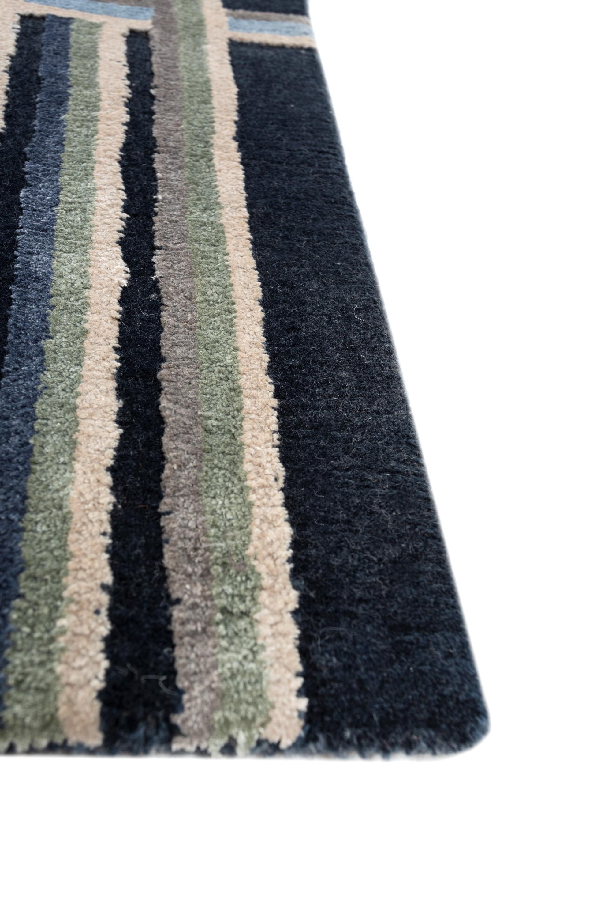 Seeking to elevate your space with a modern touch and a touch of tranquility? Wondering how to effortlessly tie together various decor elements while adding warmth and comfort to your floors? If yes, this beautiful handknotted rug  is all that you