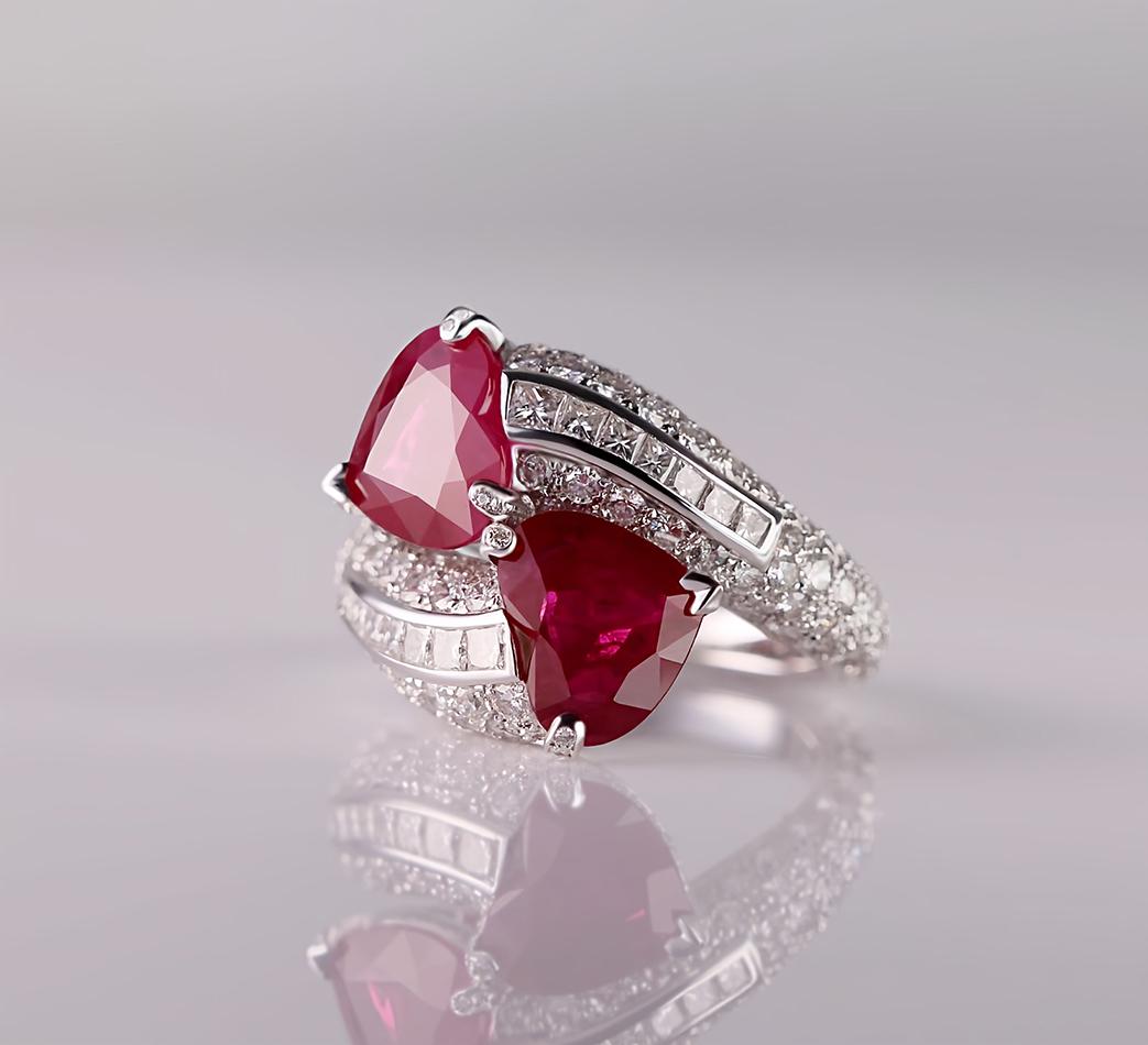 Love, in its purest essence, finds expression in this ring. The 18ct white gold, a symbol of elegance and resilience, frames two heart-shaped rubies from the land of Burma. 

These red hearts evoke images of fervent passion, deep bonds, and ethereal