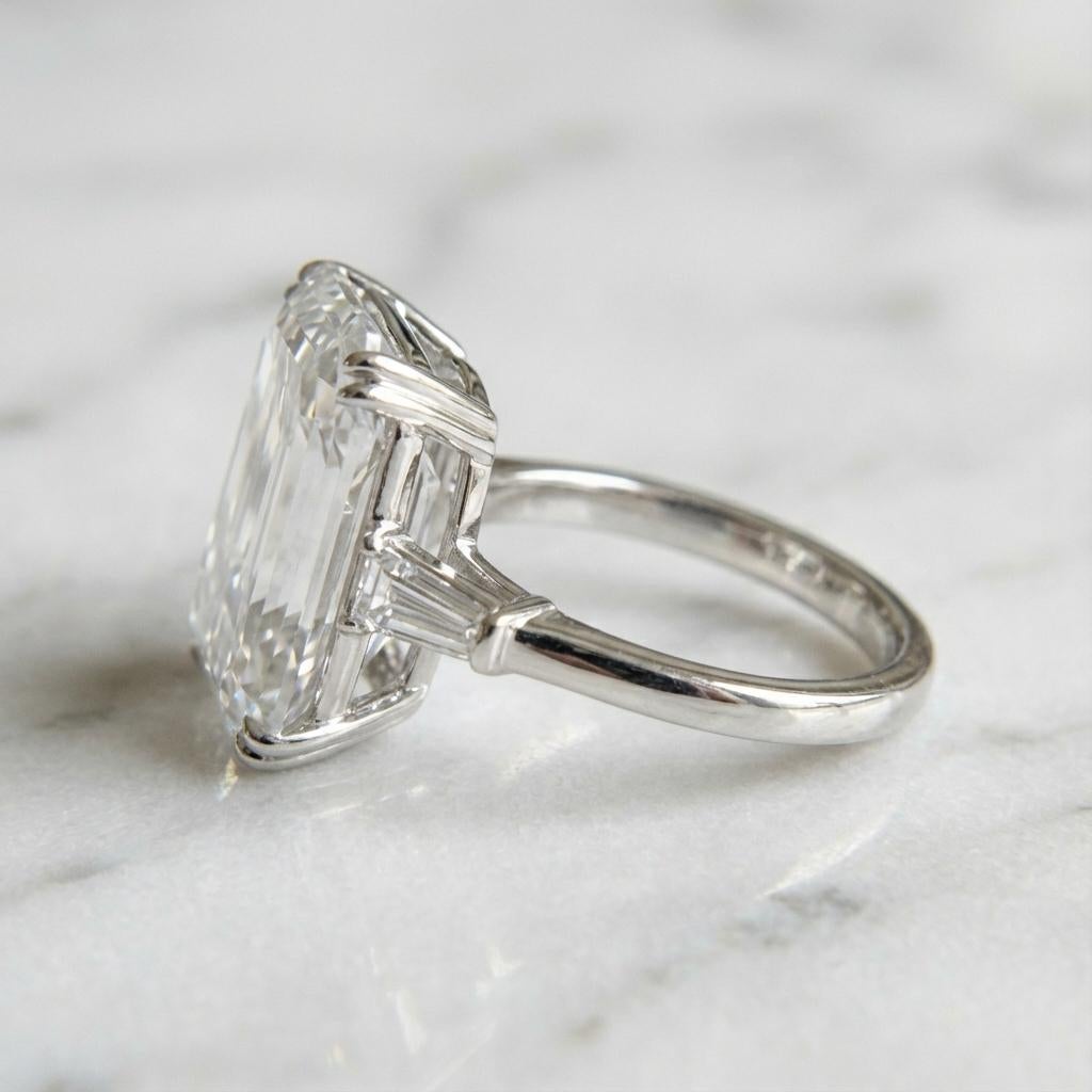 Contemporary GIA Certified 8.03 Carat Emerald Cut VVS2 Diamond Three Stone Ring in Platinum For Sale