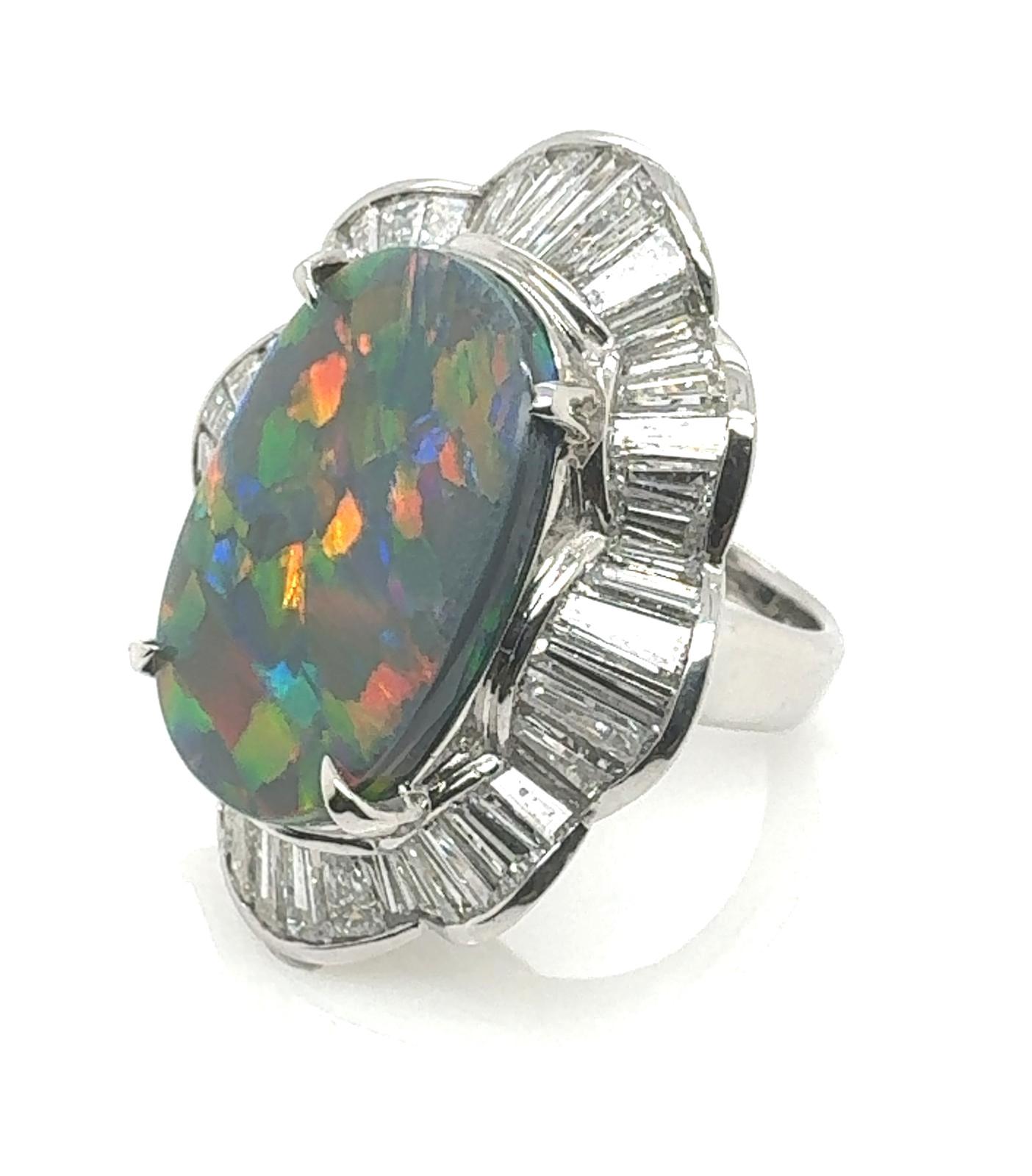 Eternal Radiance Black Opal Ring
Gemstone
Black Opal: 13.16 Carat
Diamond: 4.95 Carat
Metal: 900Platinum

          Experience the epitome of elegance with the Eternal Radiance Black Opal Ring, a stunning symbol of beauty, rarity, and timeless