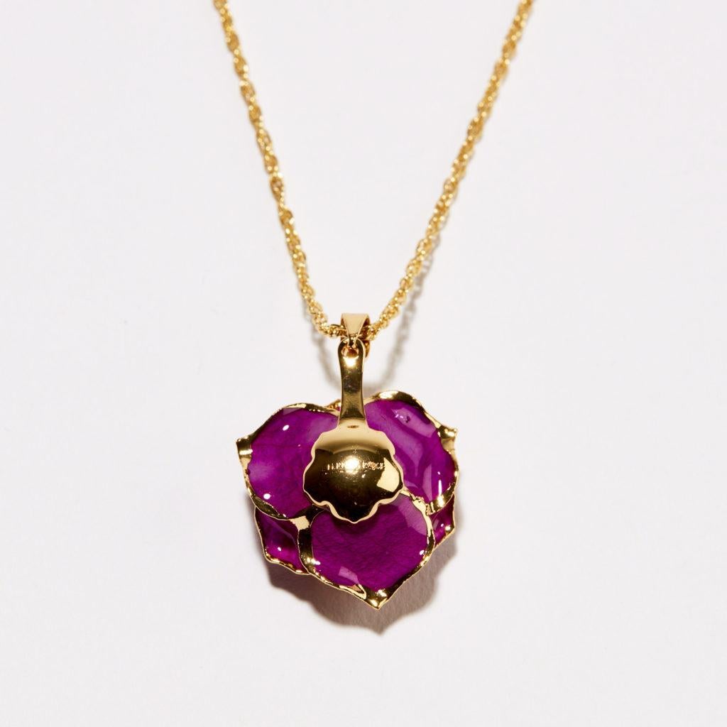 Nothing says luxury like the color purple. Our Fuchsia Bloom Eternal Necklace brings joy into your home instantly with this bright, shiny masterpiece. Perfect for birthdays, anniversaries or any day you want to say I love you in the most wonderful