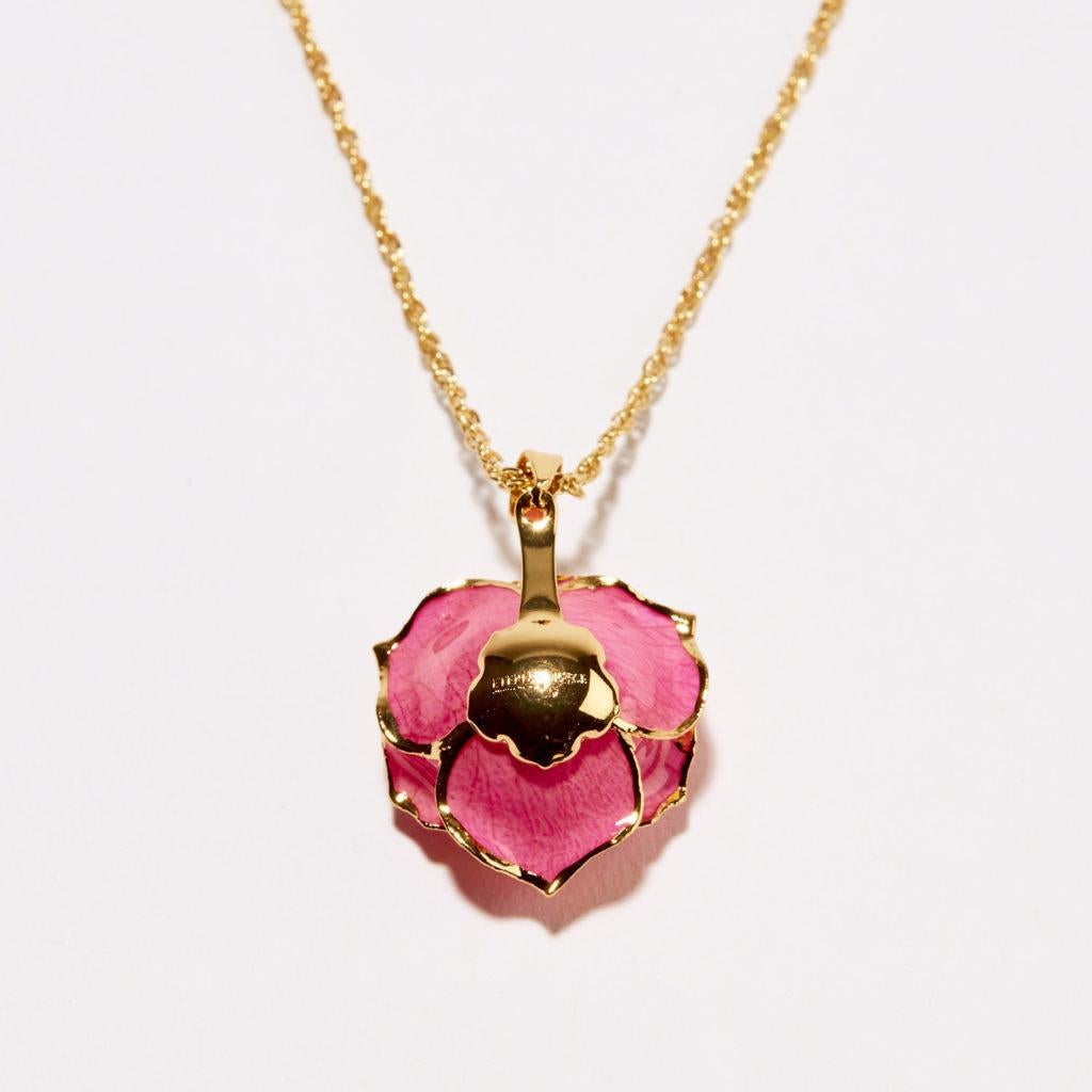 Our coral Pink Perfection Eternal Necklace speaks volumes without saying a word. Multi-toned in pink hues this treasure really shows off for your loved one. The rich details and petals trimmed in gold showcase the craftsmanship and care that went