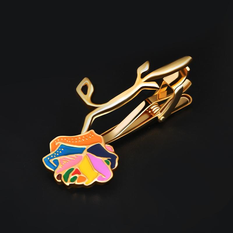 Bursting with color, our Rainbow of Love Eternal Tie Clip will take you on a romantic adventure. Each playful petal is delicately framed in gold with an artfully designed stem that compliments the vibrant rosebud. Masterfully hand-crafted, this