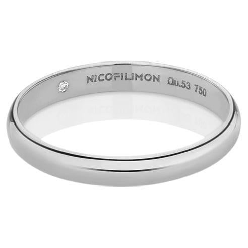 For Sale:  Eternal Wedding Band with One Brilliant Cut Diamond in 18Kt White Gold