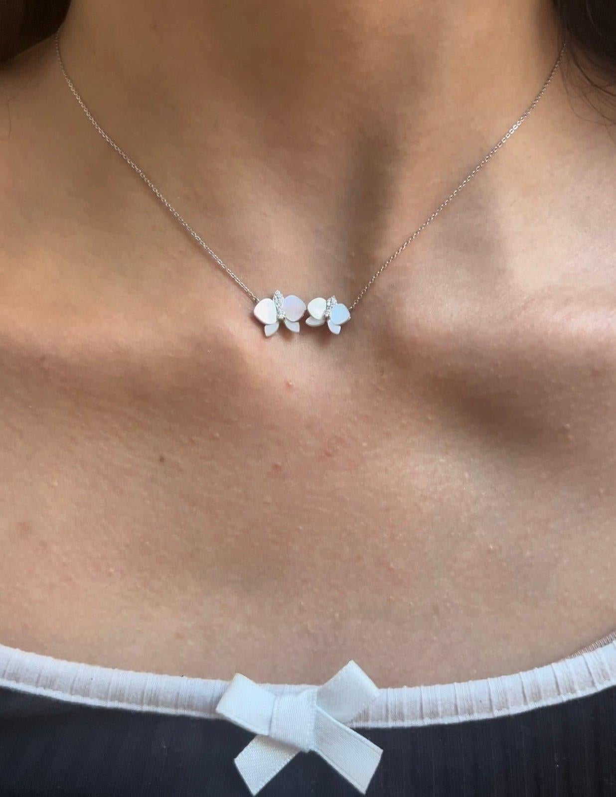 White 14K Gold Necklace

Diamonds 16-0.105cts

Mother of Pearl 8- 1.925cts 2.274g

Size: 45 cm

Metal Color: White Gold

Stone Color: White

With a heritage of ancient fine Swiss jewelry traditions, NATKINA is a Geneva based jewellery brand, which