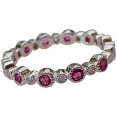 Eternity Band, 0.72 Carat of Ruby and 0.12 Carat of Diamond, 18 Karat White Gold
