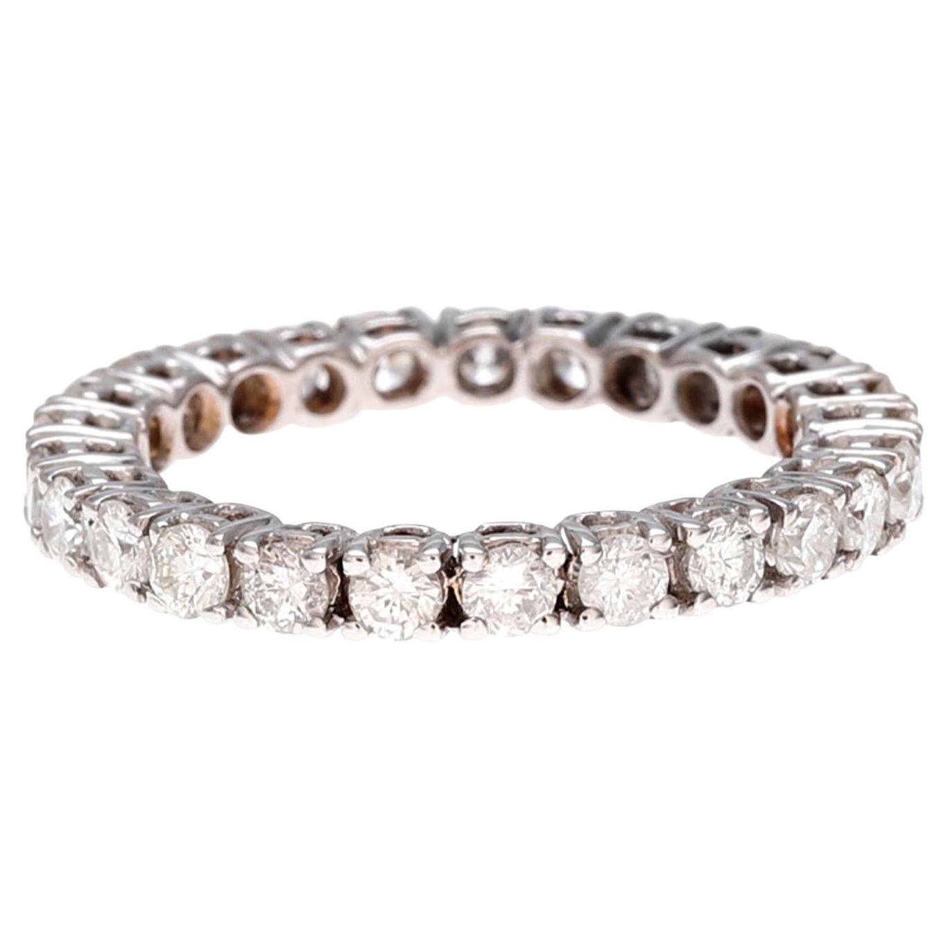 Classic and beautiful eternity band ring in white gold weight 3.55 grams 18 Karats with 32 Diamonds brilliant cut total weight 1.5 carats color G-H and clarity VS1-SI1. Setting Prongs.
Ring size: 14 Europe/ 53.8 American

