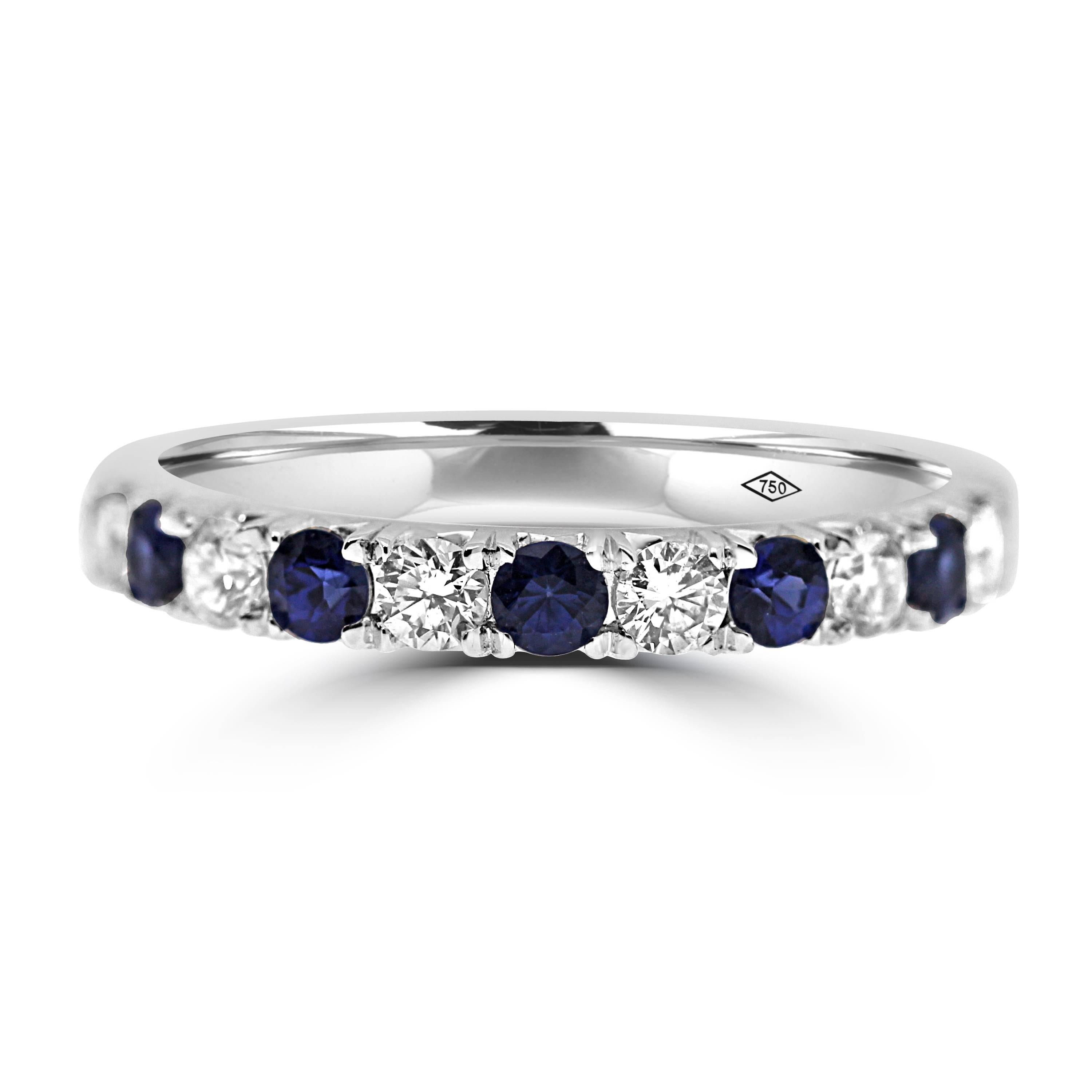 elegant and classy eternity band,
half set with brilliant cut diamonds of 0.45ct total and blue sapphire gemstones of 0.47ct total, mounted in 18kt white gold.
Winston special setting.

 