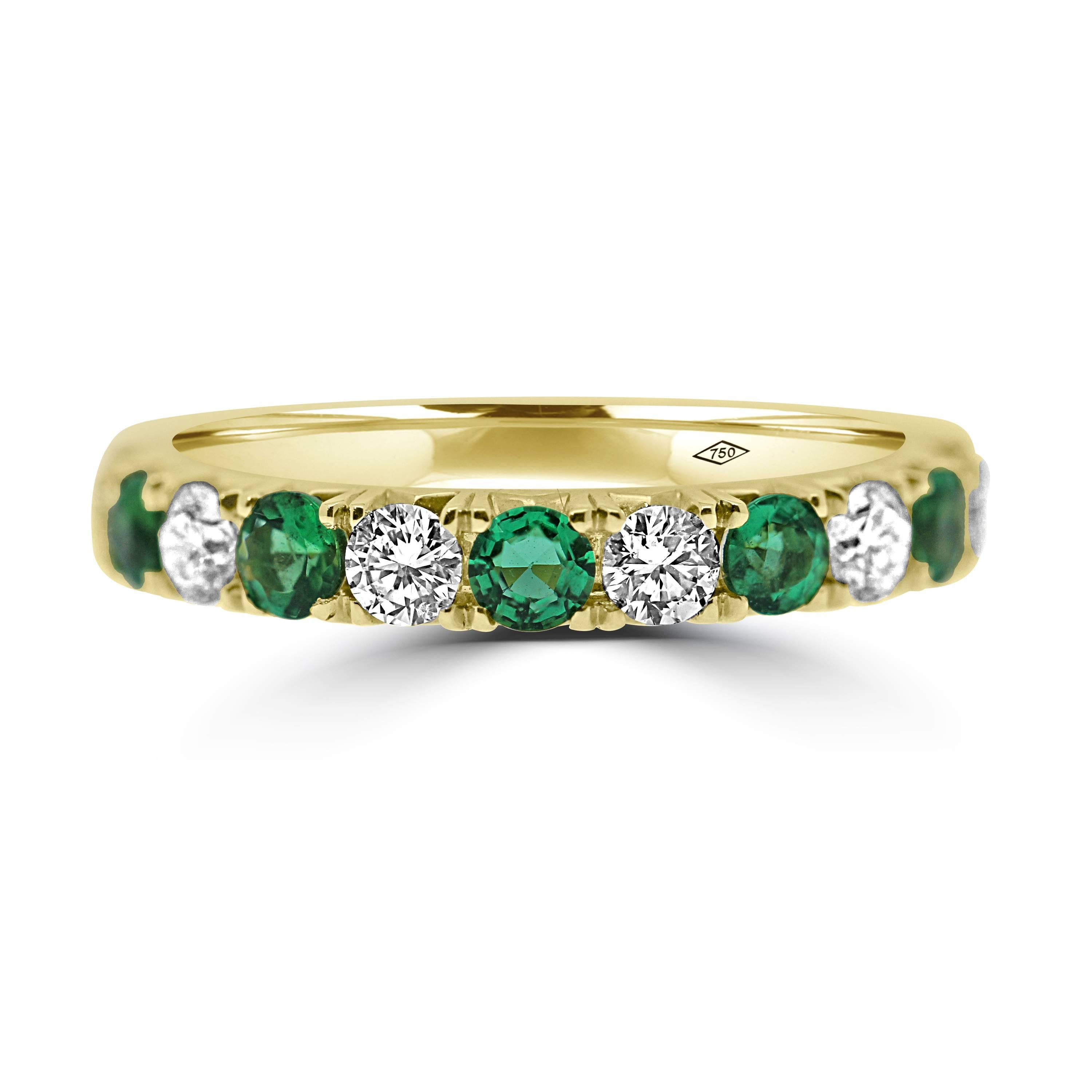elegant and classy eternity band,
half set with brilliant cut diamonds of 0.51ct total and emerald gemstones of 0.44ct total, mounted in 18kt yellow gold.
Winston special setting.