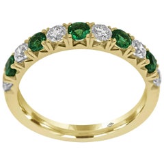 Eternity Band Half Set with Diamonds and Emerald gemstones