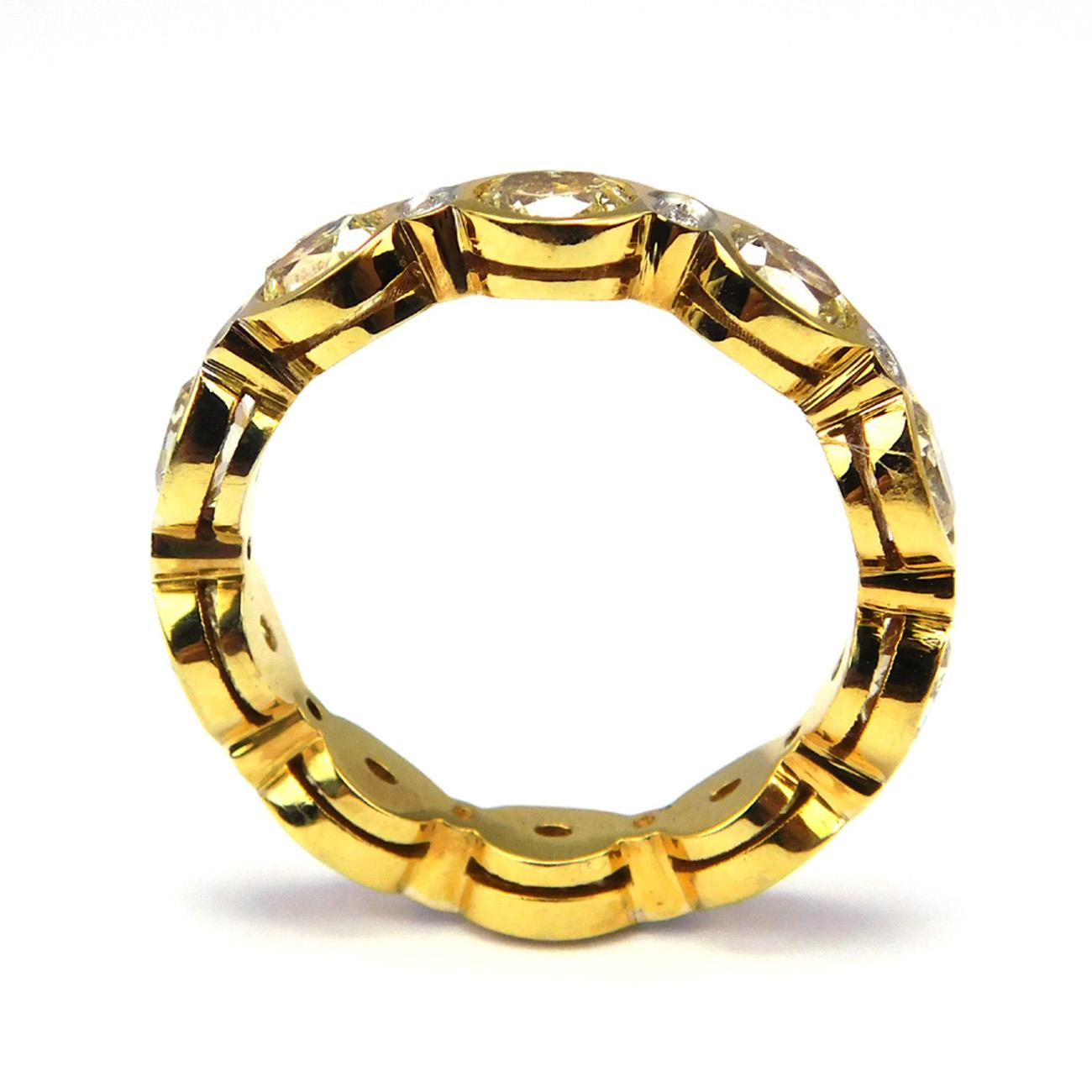 Oval Cut Eternity band in 18K YG with Rounds and Fancy Yellow Oval Diamonds. D3.29ct.t.w. For Sale
