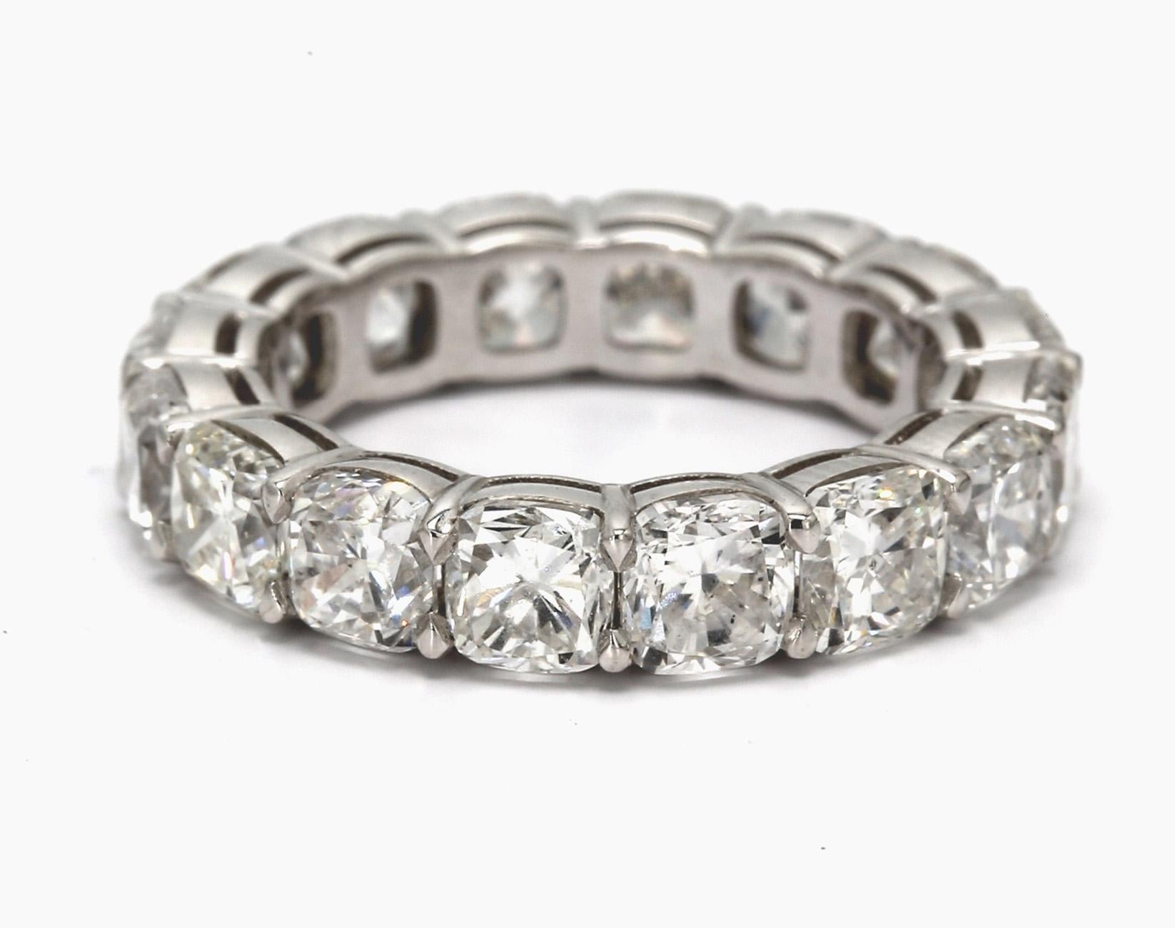 Eternity band in platinum with basket claw prong set square cushion cut diamonds. D7.98ct.t.w.