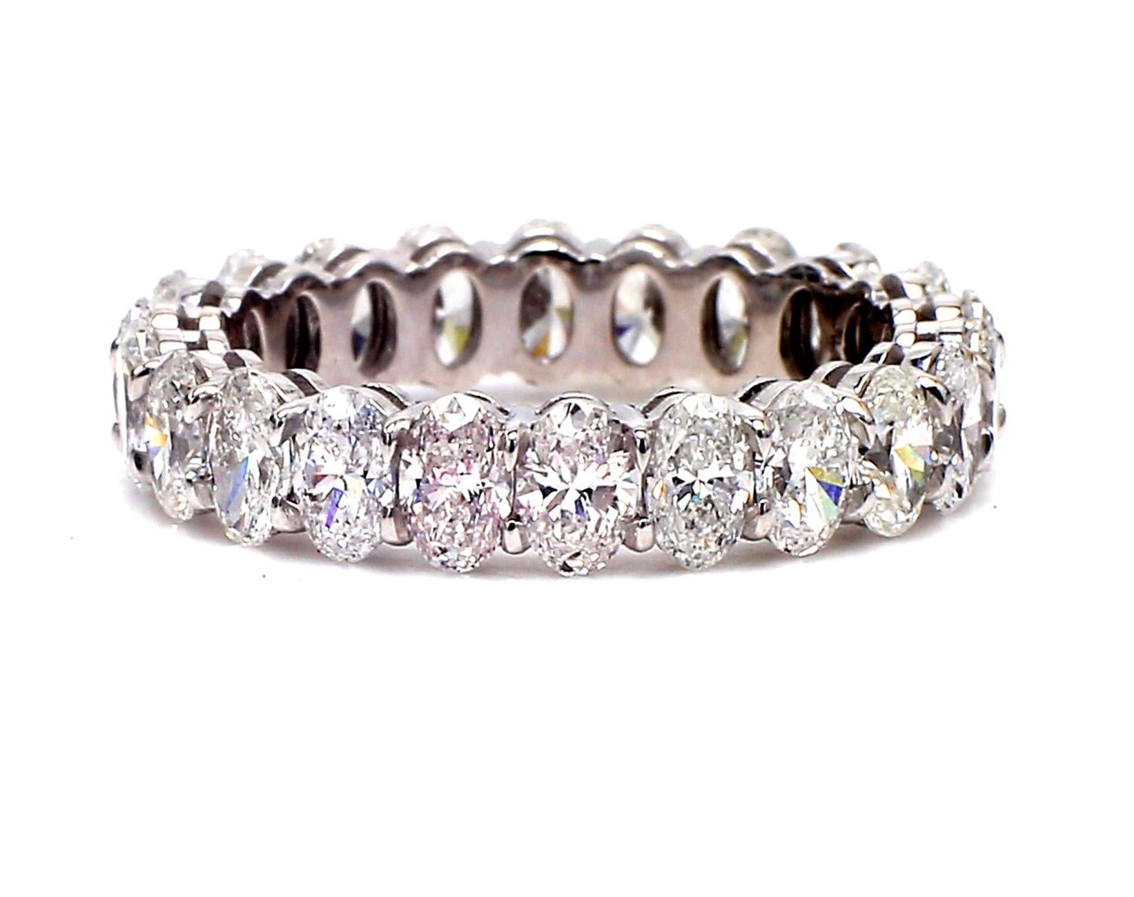 Eternity band in platinum with basket prong set (22) oval cut diamonds. D4.16ct.t.w.