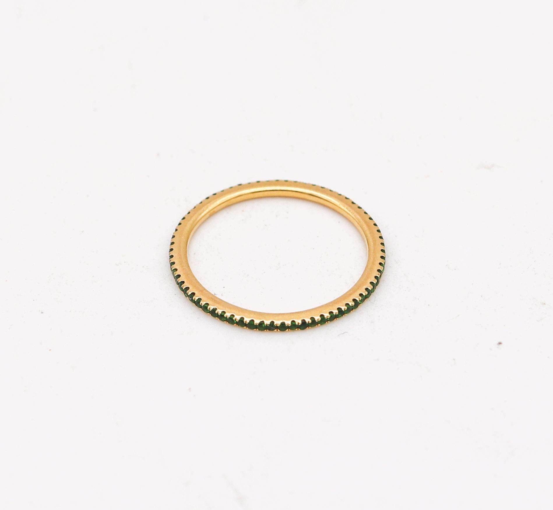 Modern Eternity Band Ring Divider in 18Kt Yellow Gold with Vivid Green Tsavorites For Sale