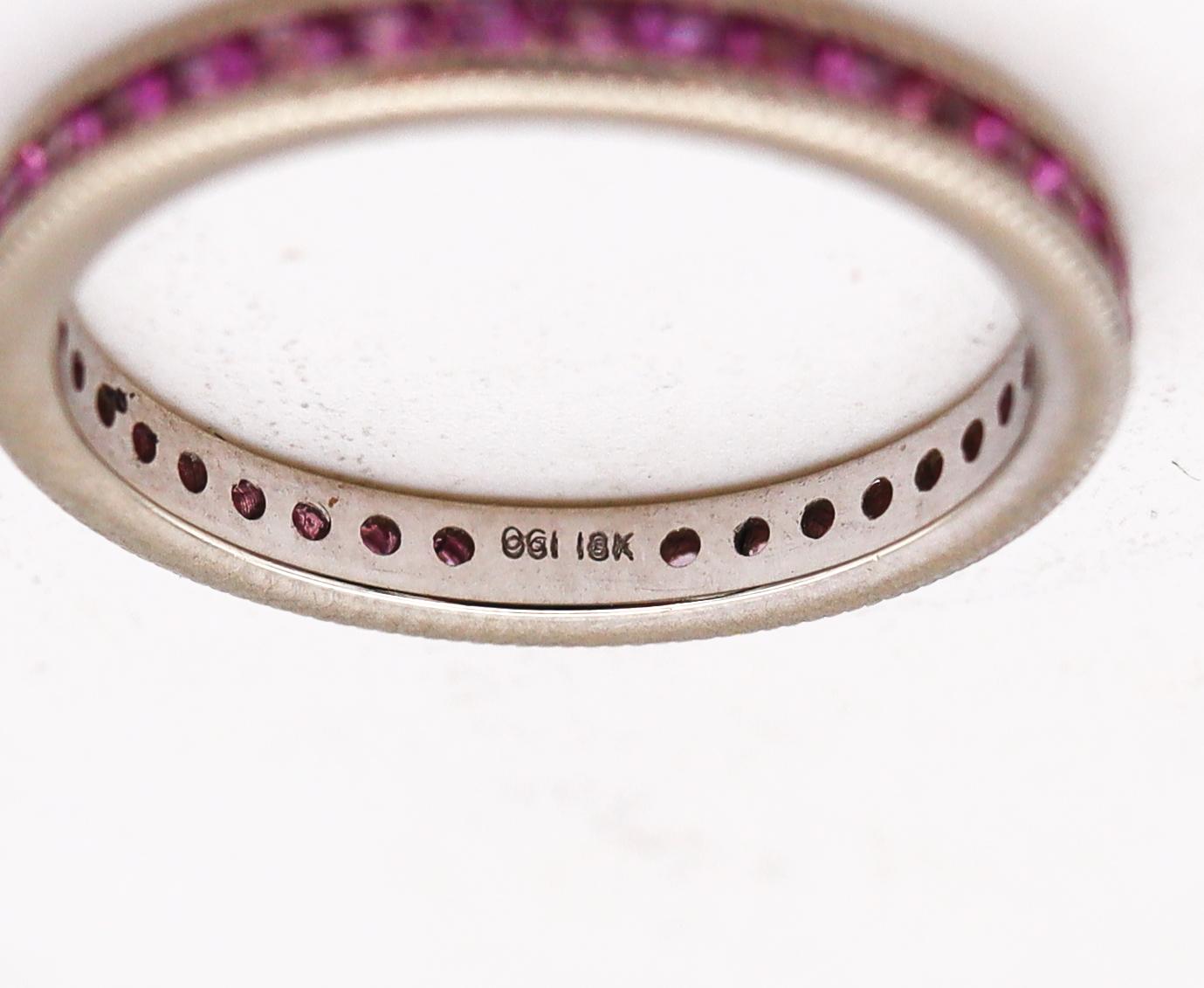 Modern Eternity Band Ring in 18Kt White Gold with 1.02 Cts in Vivid Pink Sapphires For Sale