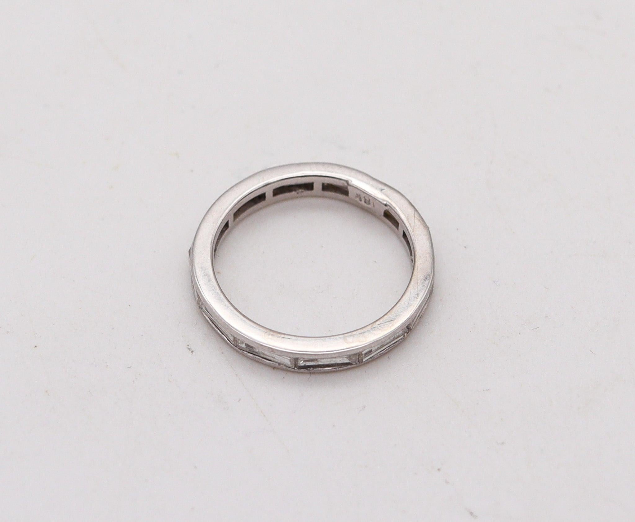 Eternity band ring with diamonds.

Beautiful and unusual eternity band ring embellished with twelve calibrated earth mined natural diamonds. The ring was crafted in one solid round piece of 18 karats white gold with high polished finish.

Diamonds: