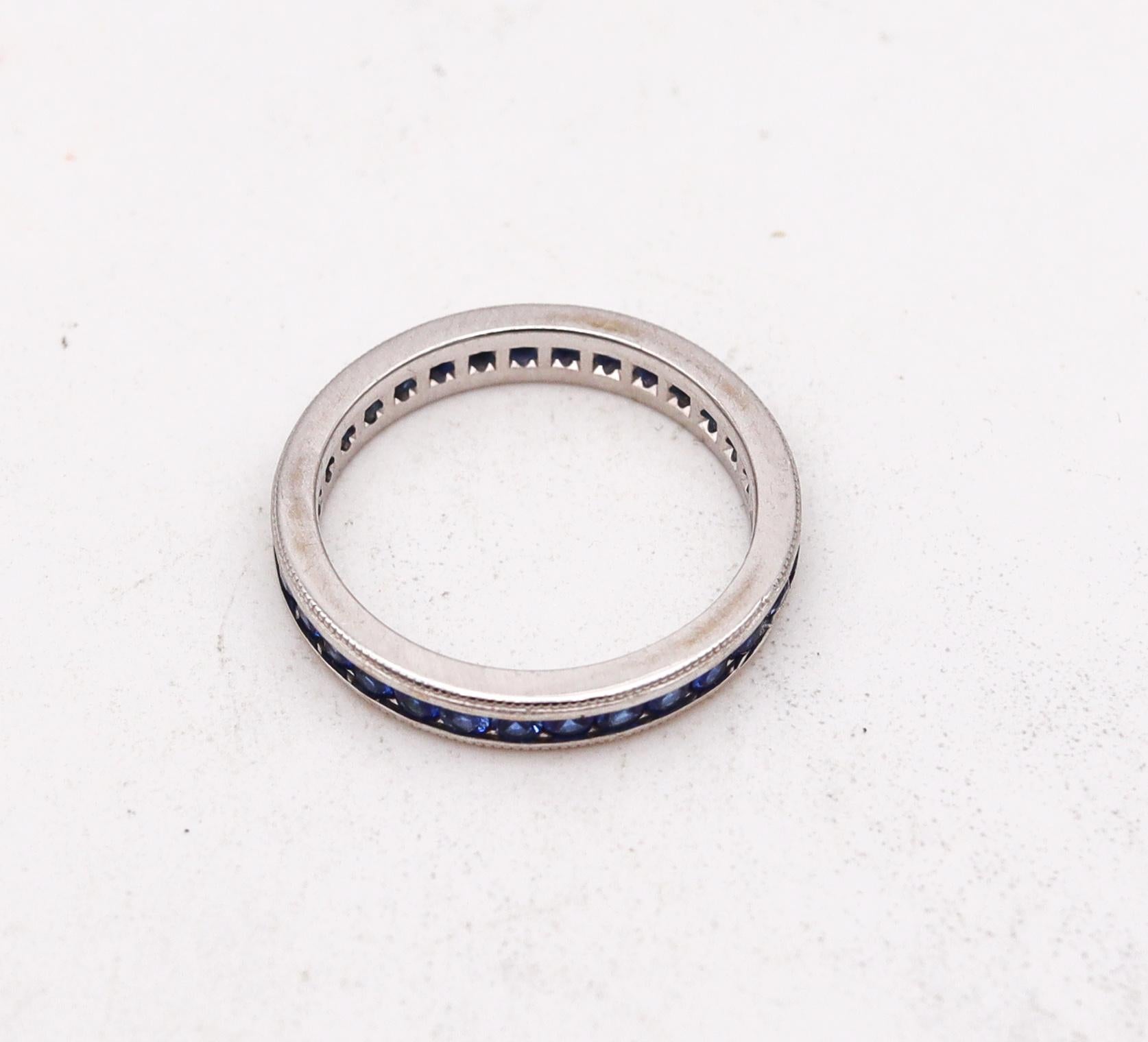 Modern Eternity Band Ring in 18Kt White Gold with 1.20 Cts in Vivid Blue Sapphires For Sale