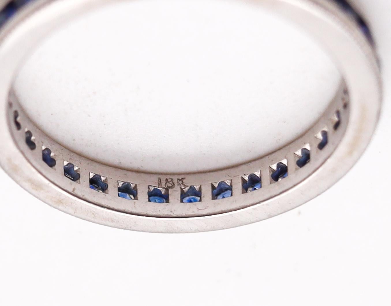 Brilliant Cut Eternity Band Ring in 18Kt White Gold with 1.20 Cts in Vivid Blue Sapphires For Sale