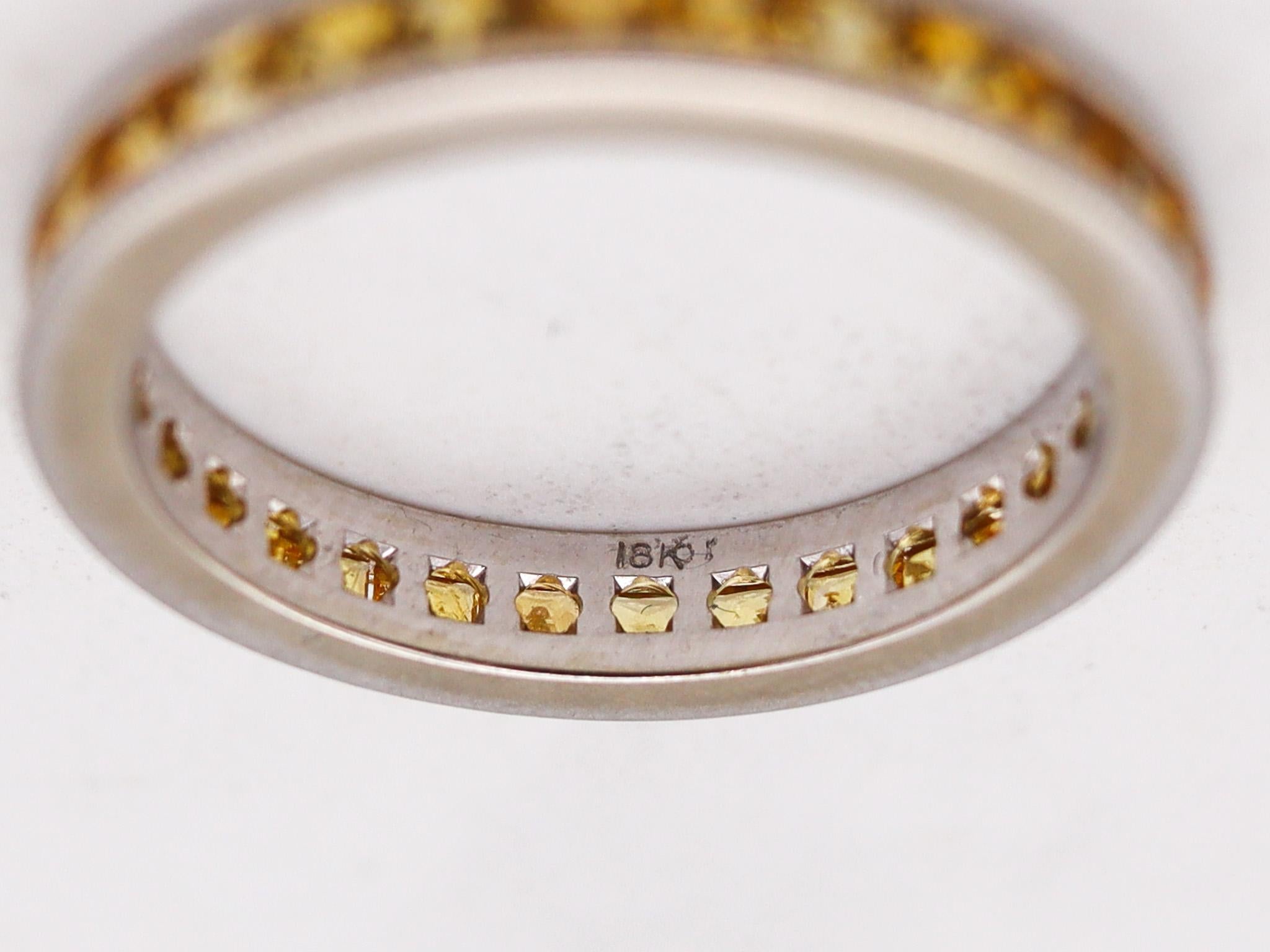 Modern Eternity Band Ring in 18kt White Gold with 3.45ct of Natural Yellow Sapphires For Sale