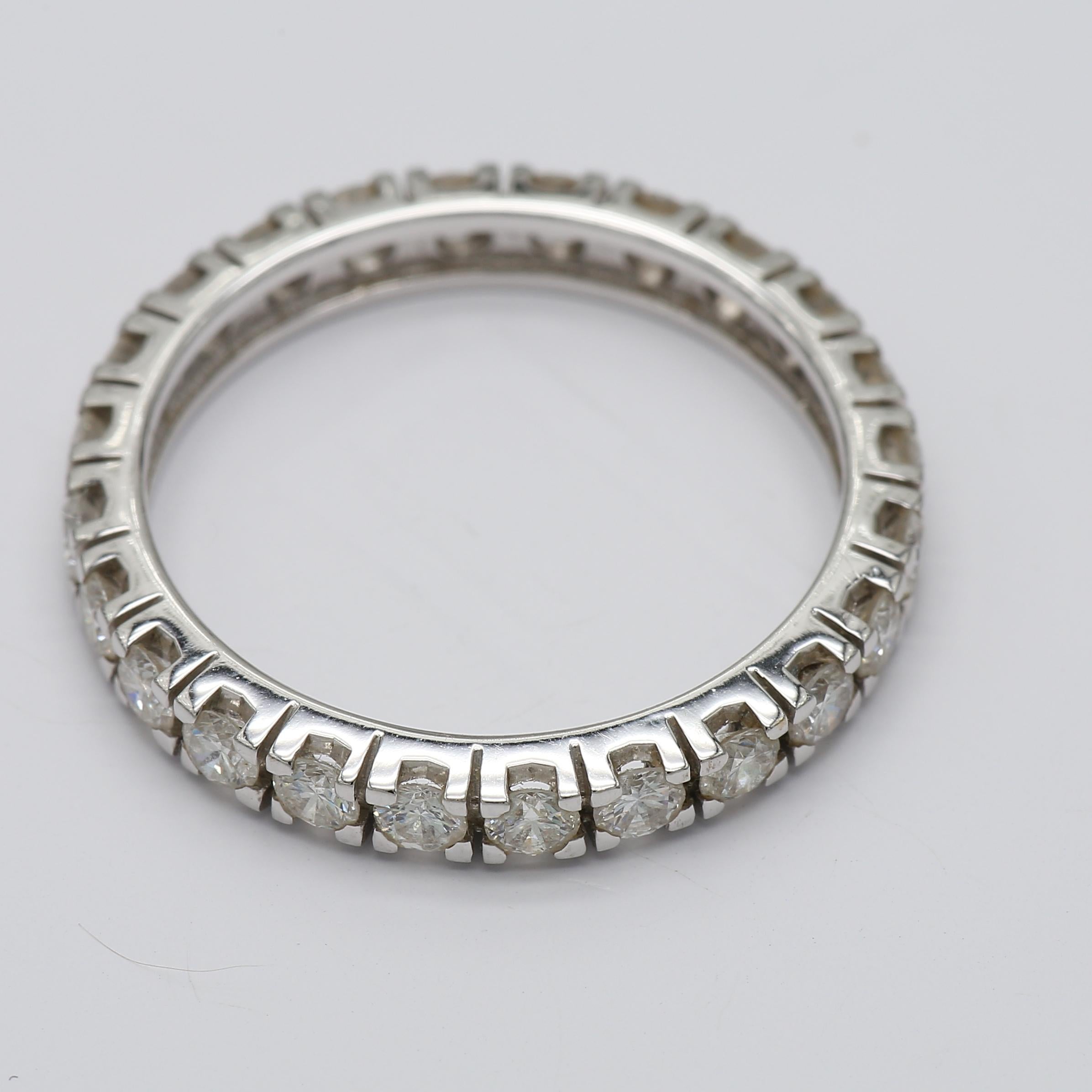 Delicate Eternity Band set with 24 Round Diamonds (Total Carat Weight 1.90 ) in White Gold. Upgrade your jewelry collection with this classic ring or gift it to your loved. Anyway this classic diamond eternity ring will bring you sparkles and joy