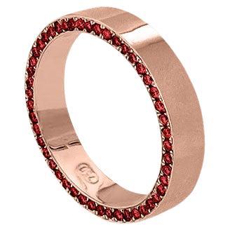 For Sale:  Eternity band wedding band in 18ct Rose Gold with Rubies